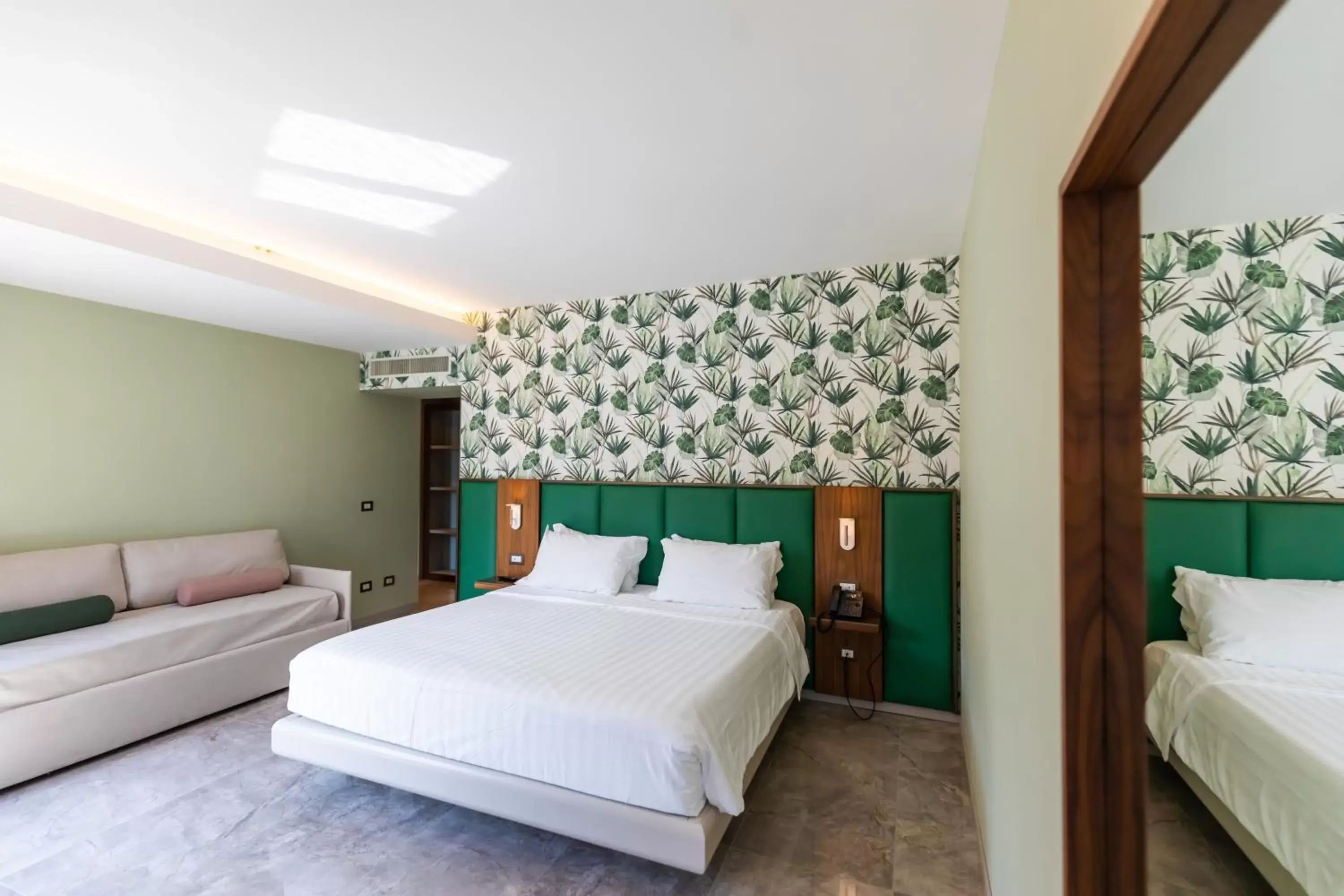 Bed in Solmaris Tropea Rooms & Suites