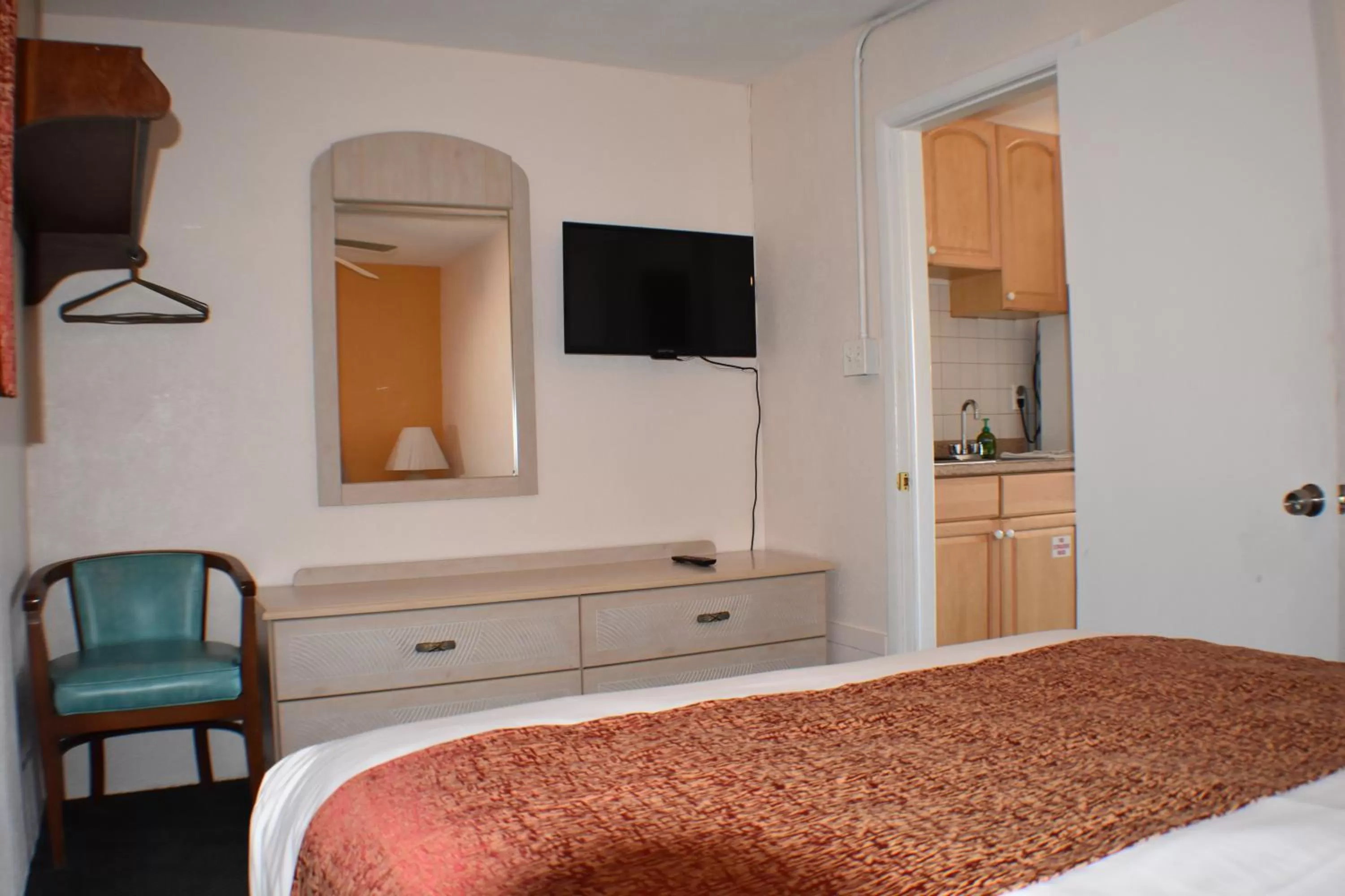 Bed in Blue Water Motel