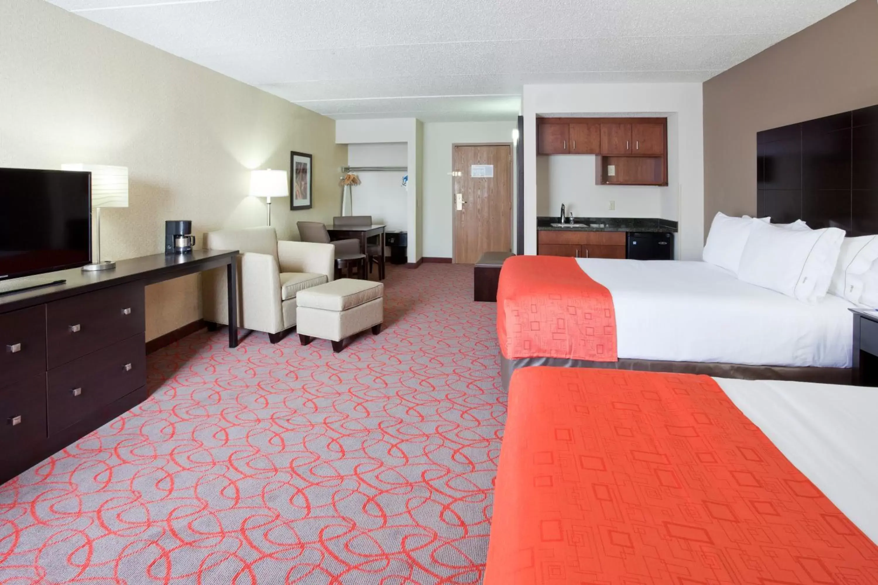 Photo of the whole room, TV/Entertainment Center in Holiday Inn Express & Suites Bloomington West, an IHG Hotel