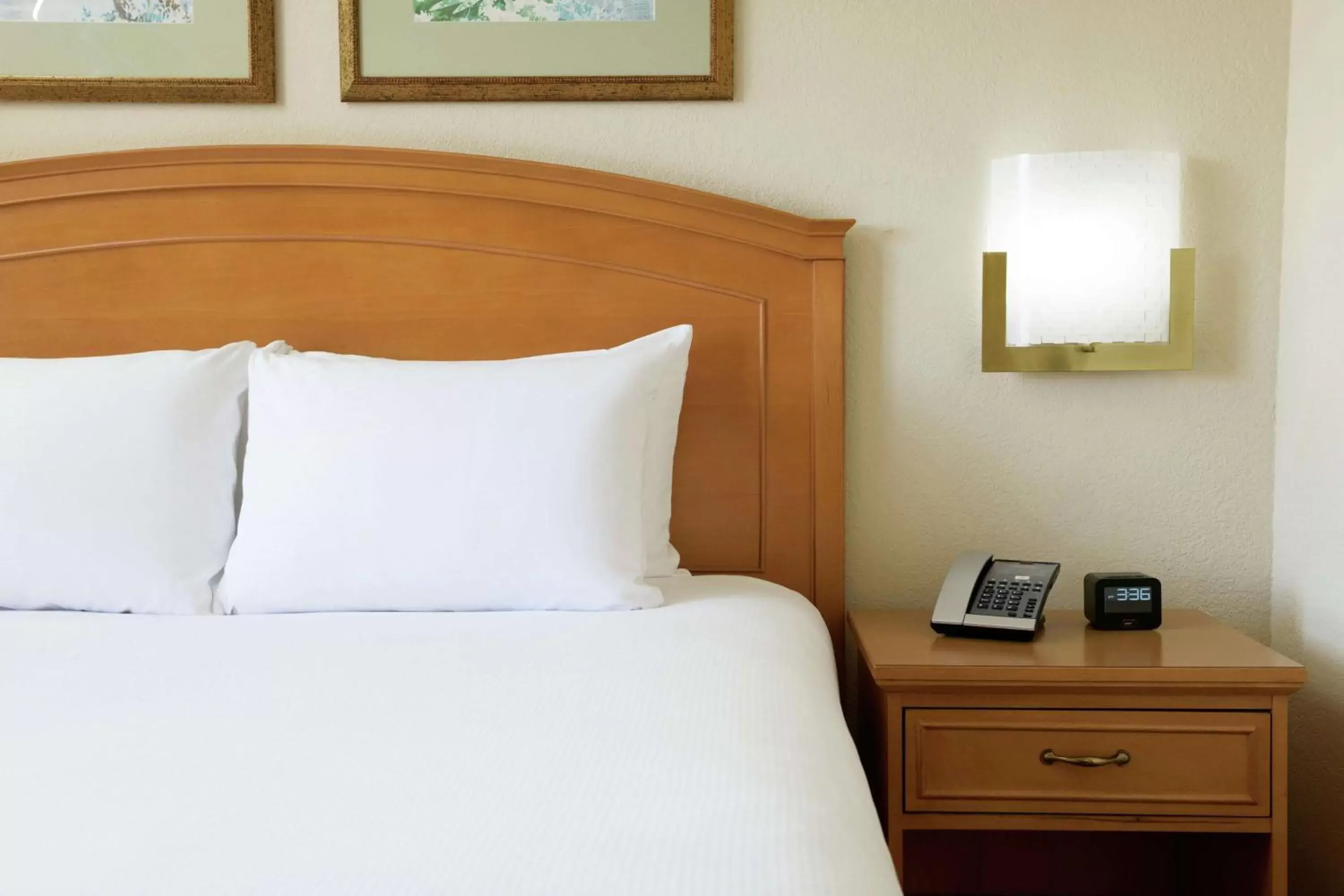 Bed in Hilton Boca Raton Suites