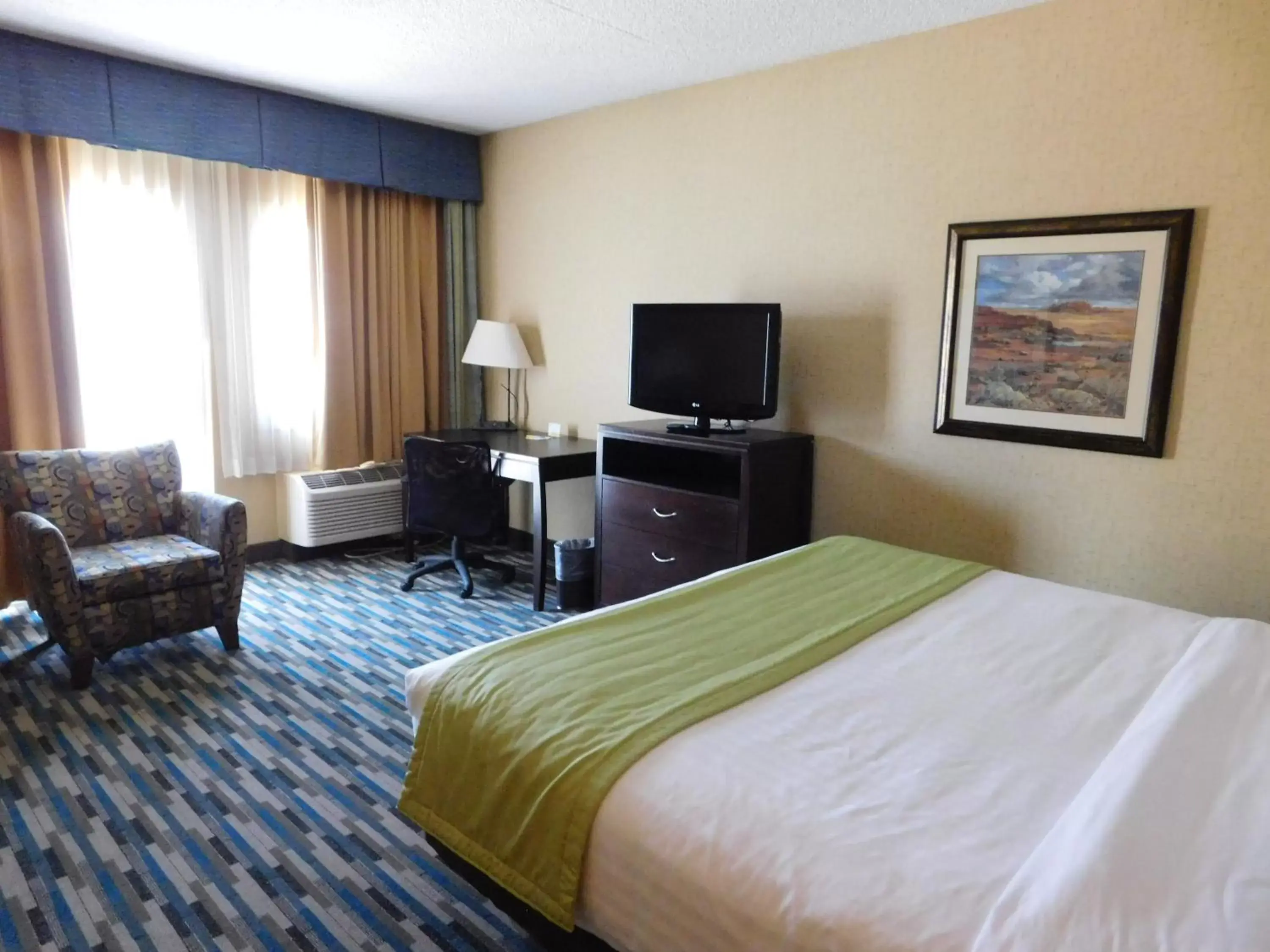 Photo of the whole room, TV/Entertainment Center in Days Hotel by Wyndham Mesa Near Phoenix