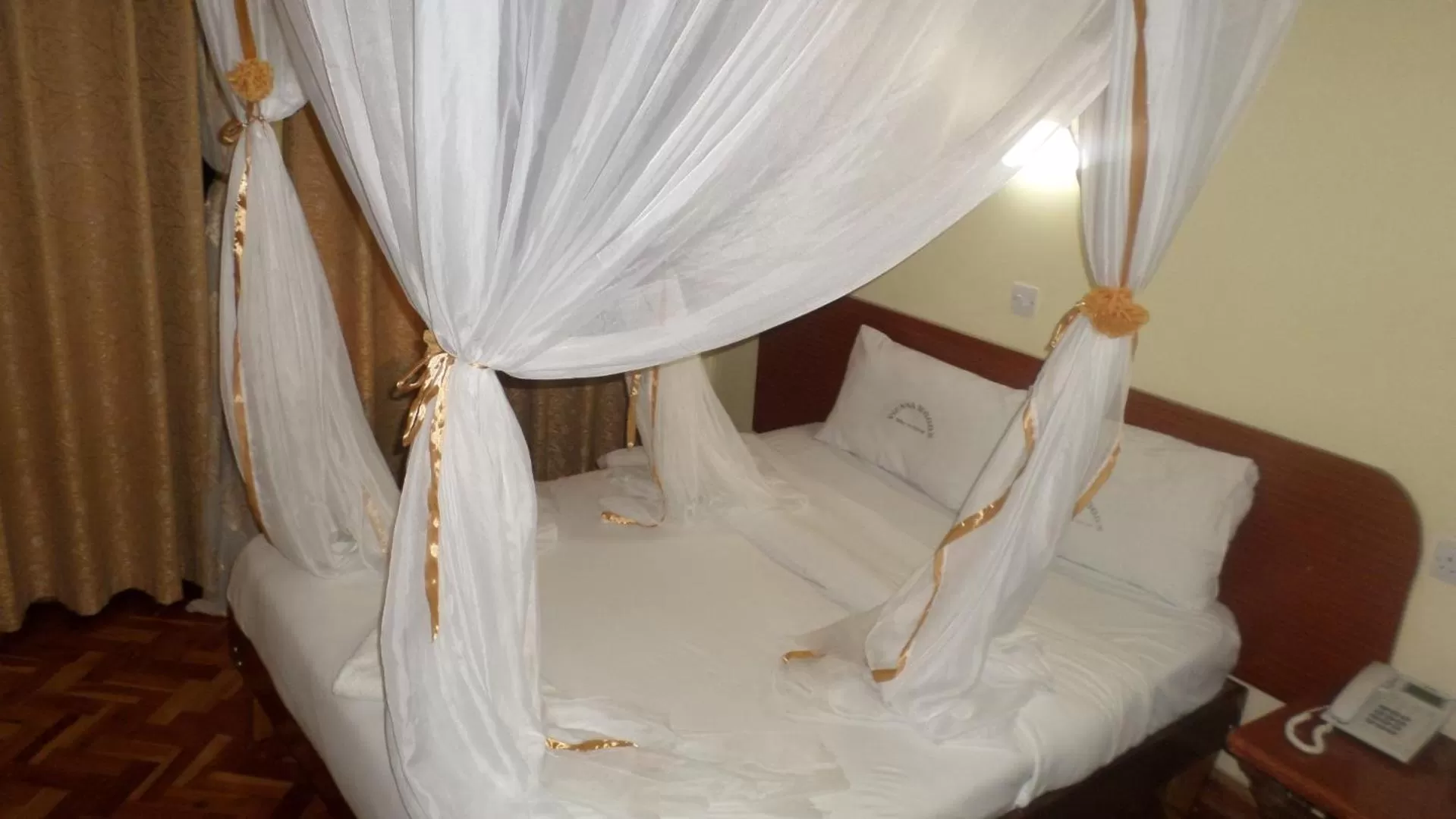 Bed in Vienna Woods Hotel Nakuru