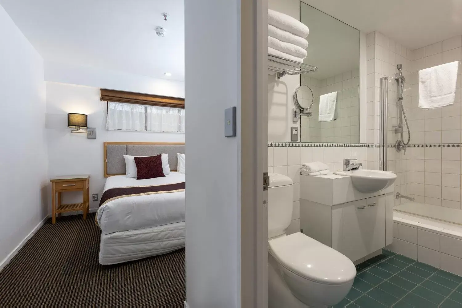 Bathroom in Fino Hotel & Suites