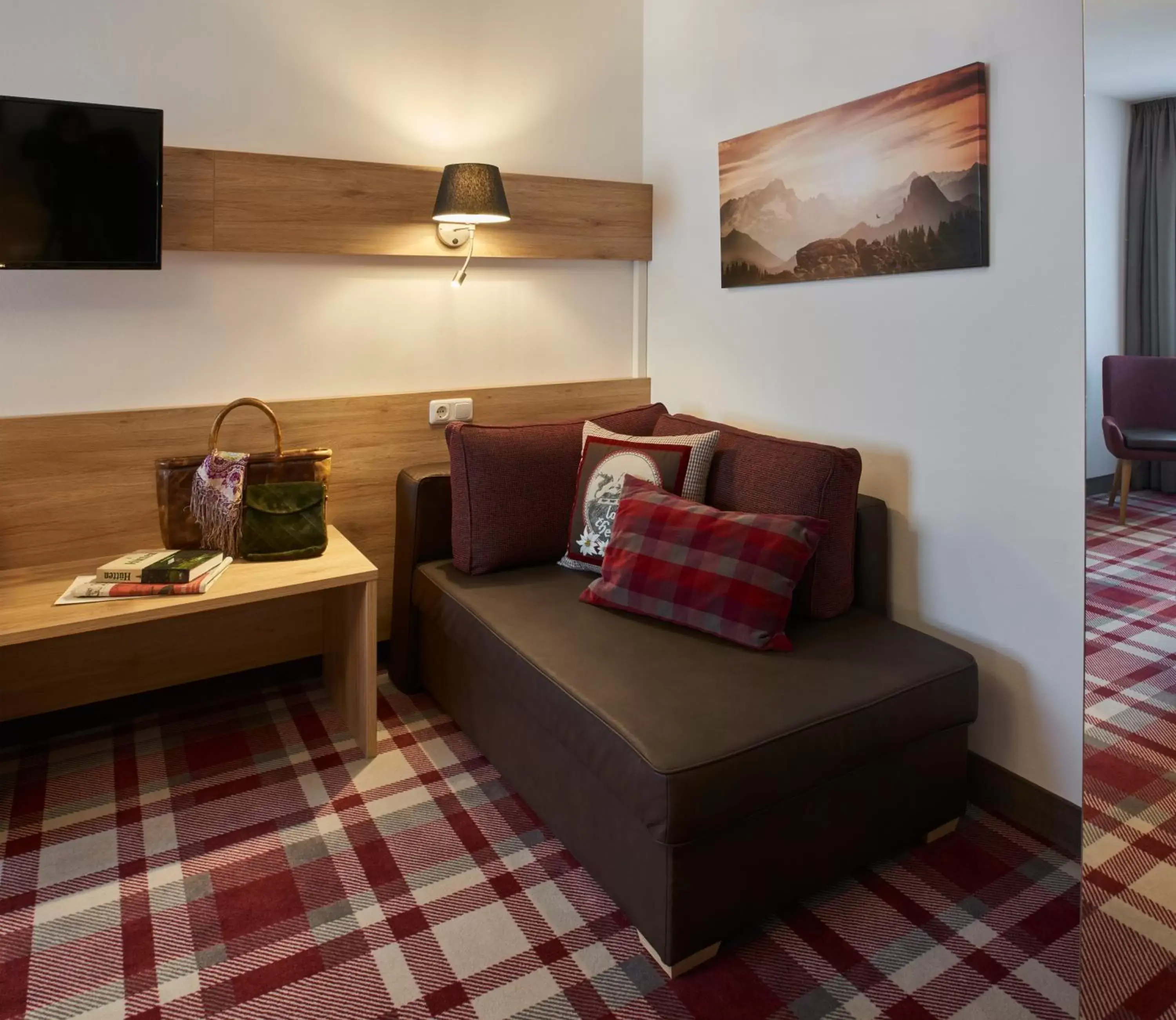 Photo of the whole room, Seating Area in Hotel Weißbräu