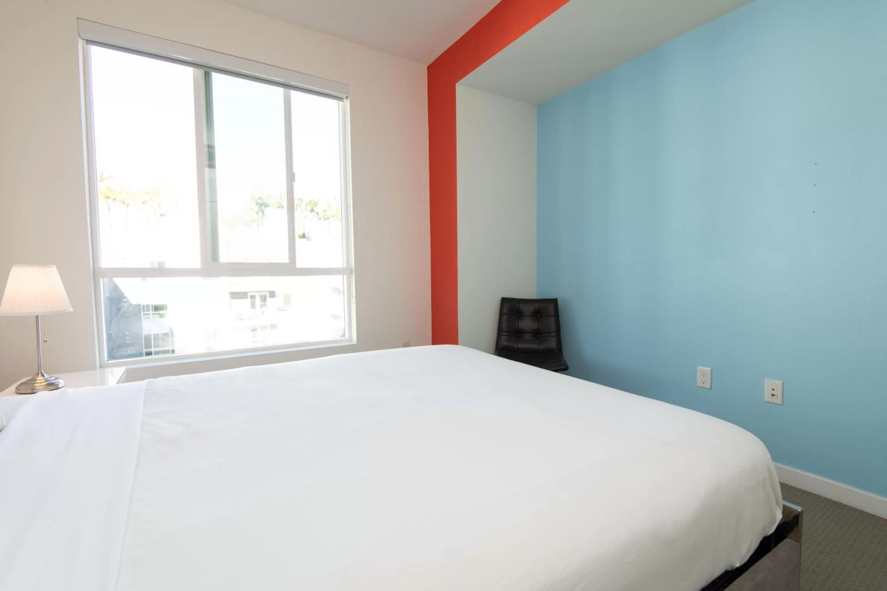 Bed in Modern Apartment Rentals