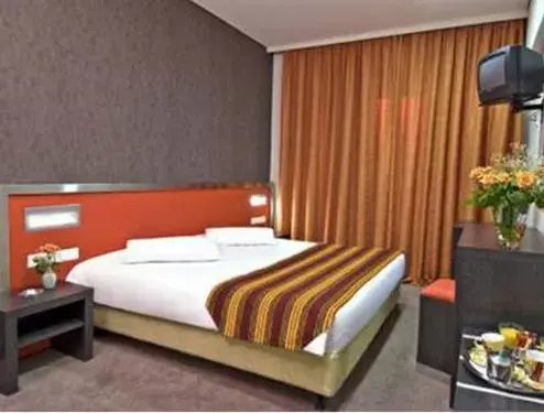 Bed in Hotel Des Roses