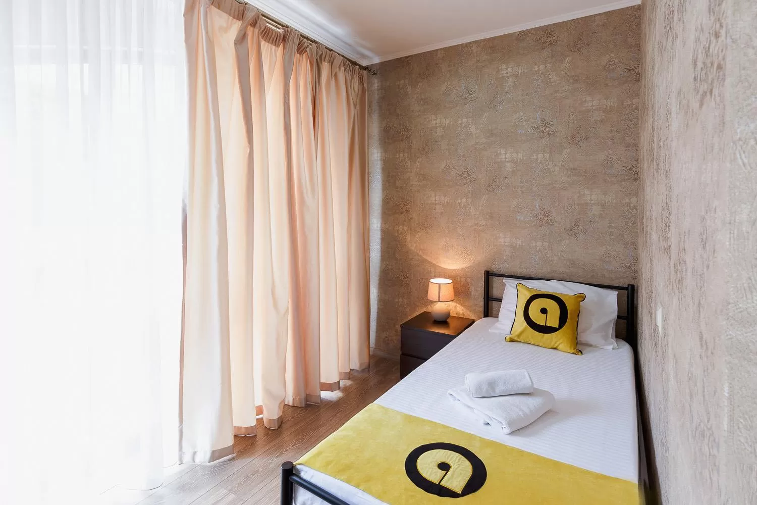 Bed in Aura Plaza Hotel