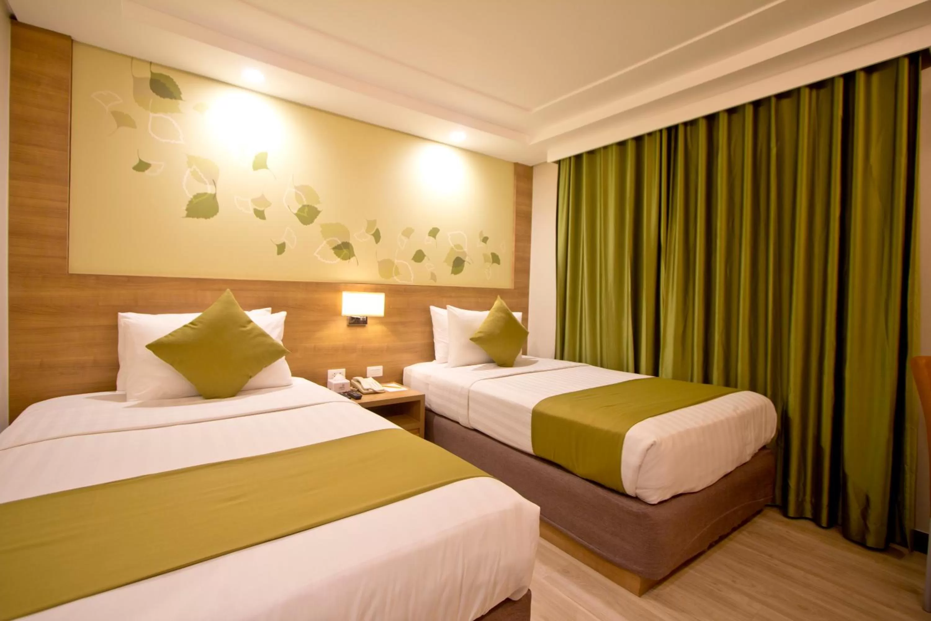 Bed in Crown Regency Hotel Makati