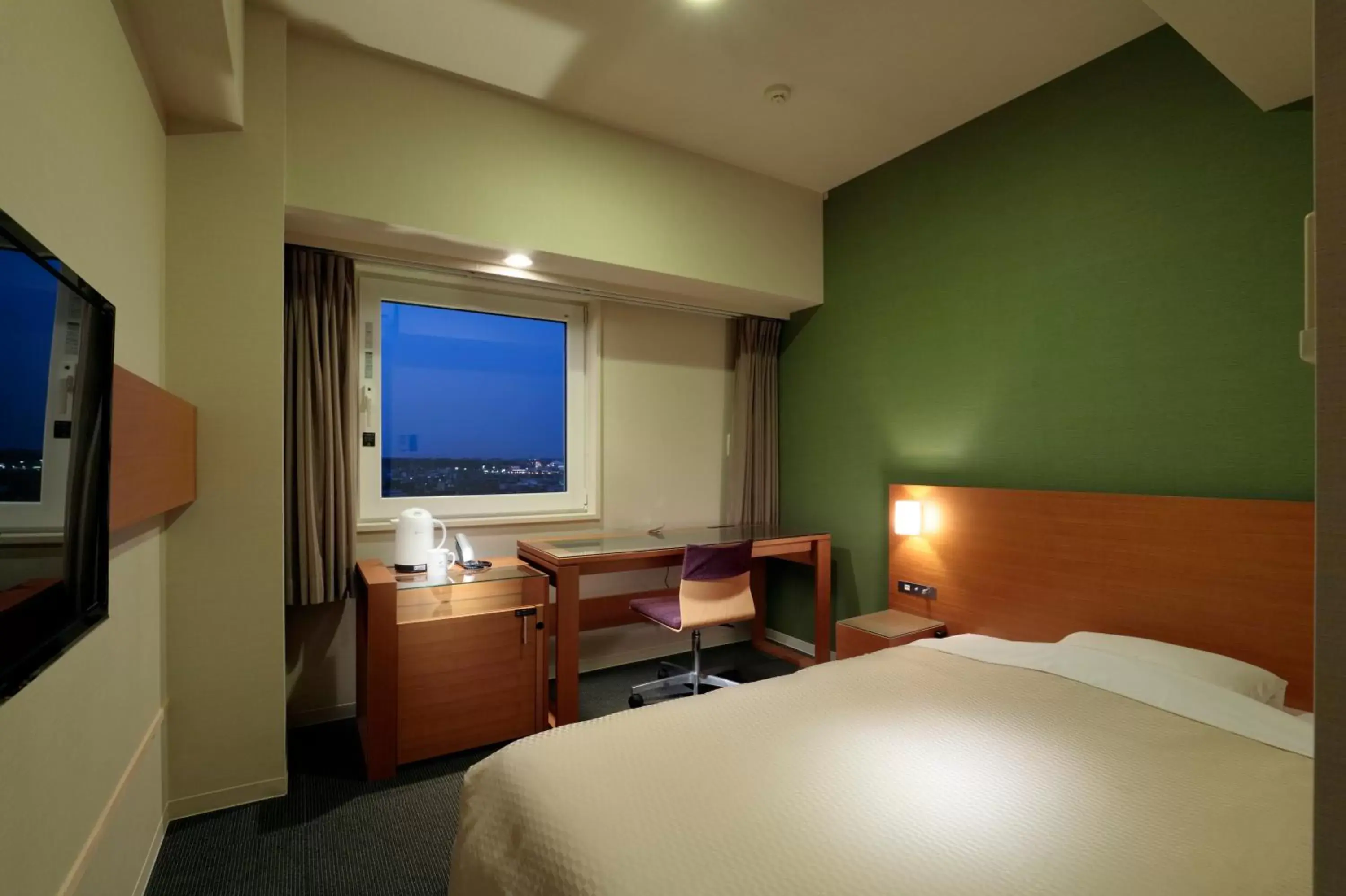 Bedroom in Candeo Hotels Handa