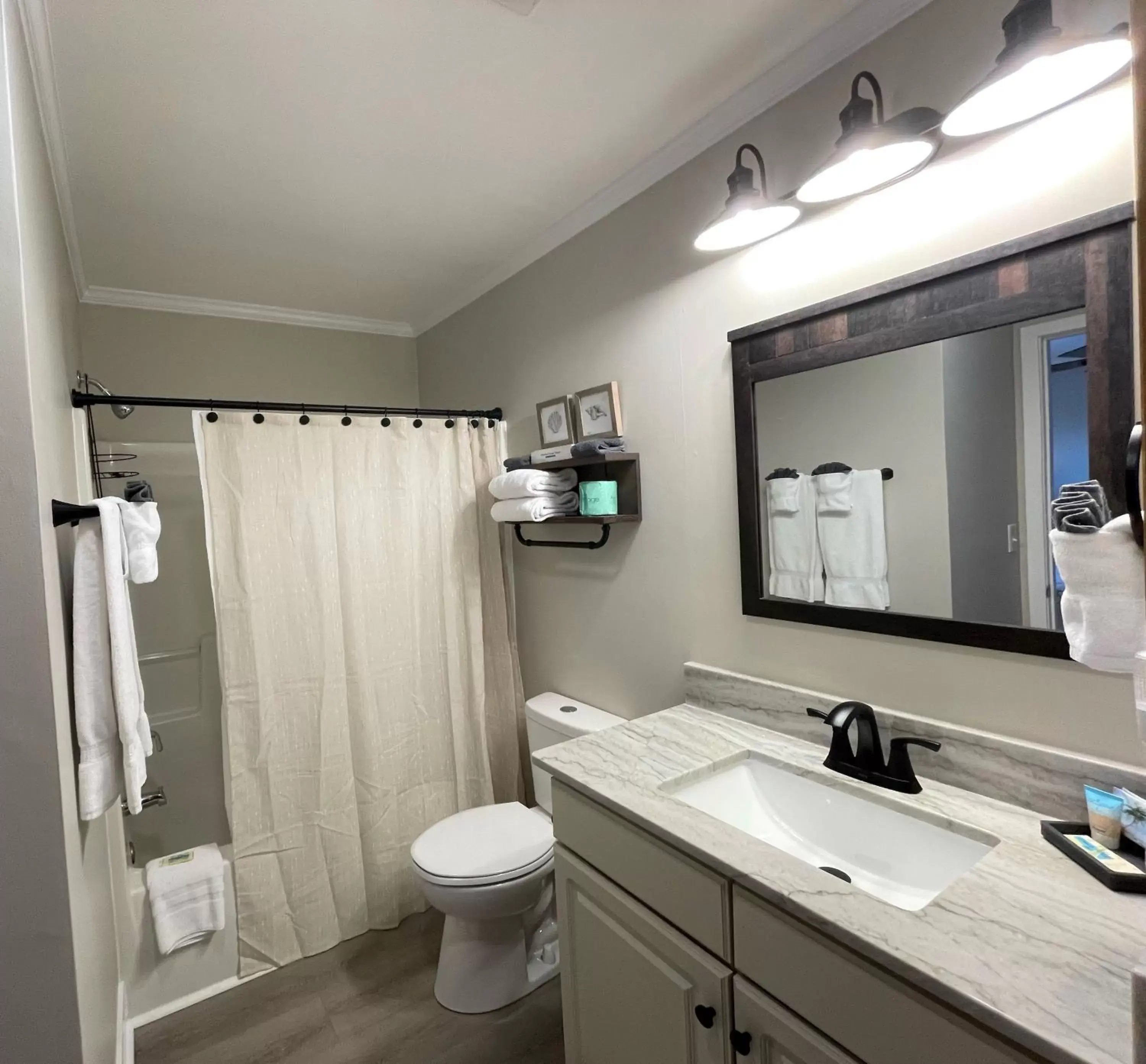 Bathroom in Sandpeddler Inn and Suites