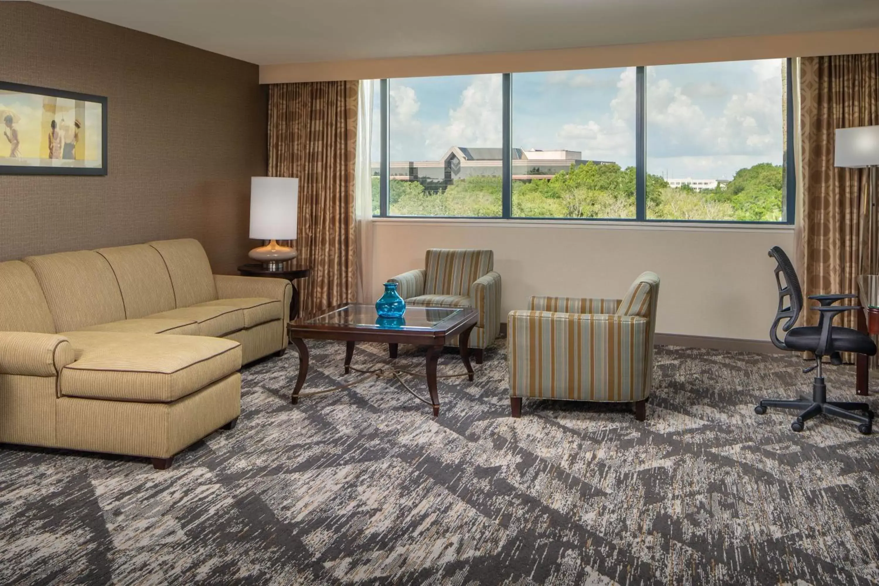 Photo of the whole room, Seating Area in Sheraton Tampa Brandon Hotel