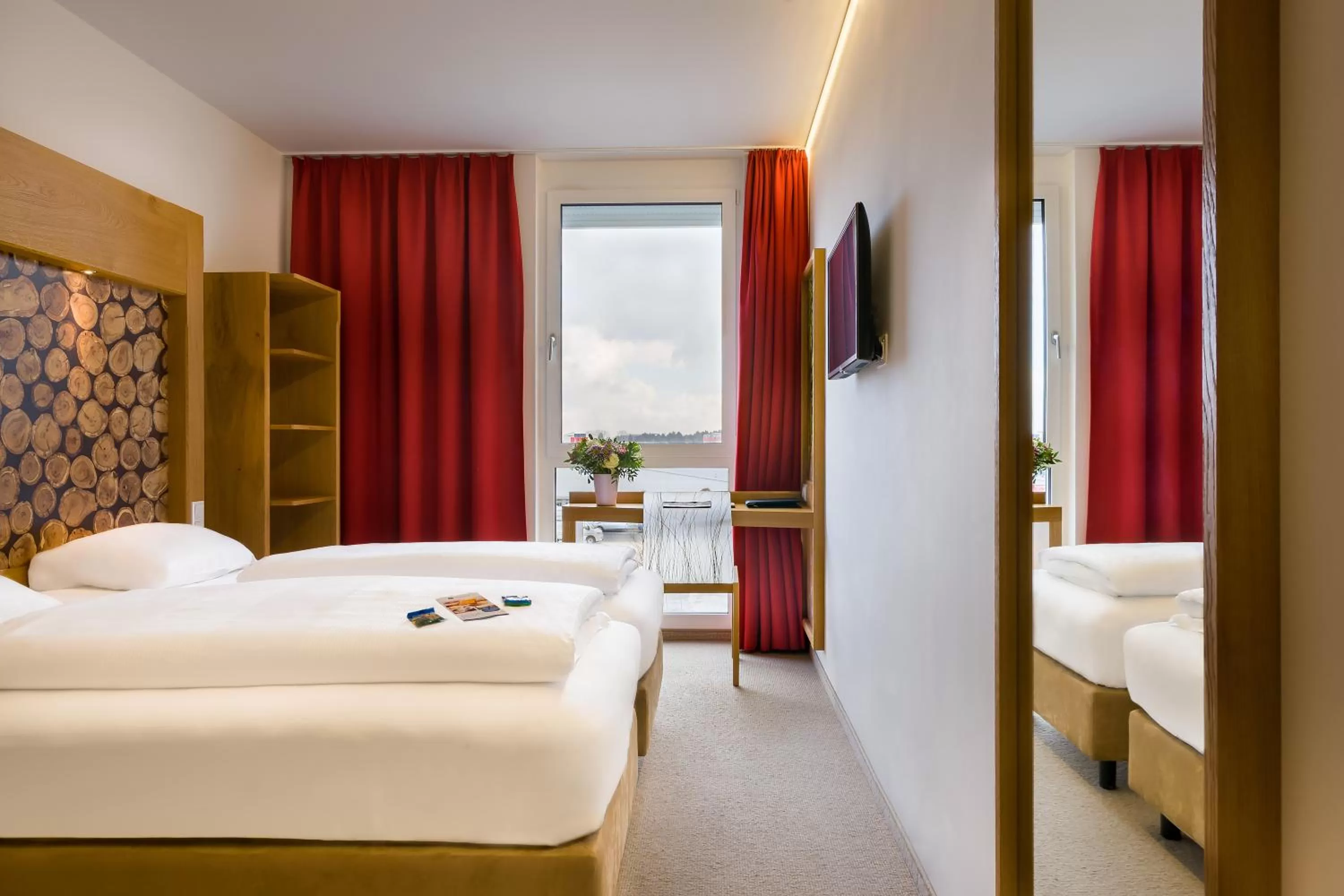 Photo of the whole room, Bed in Atomis Hotel Dachau Munich