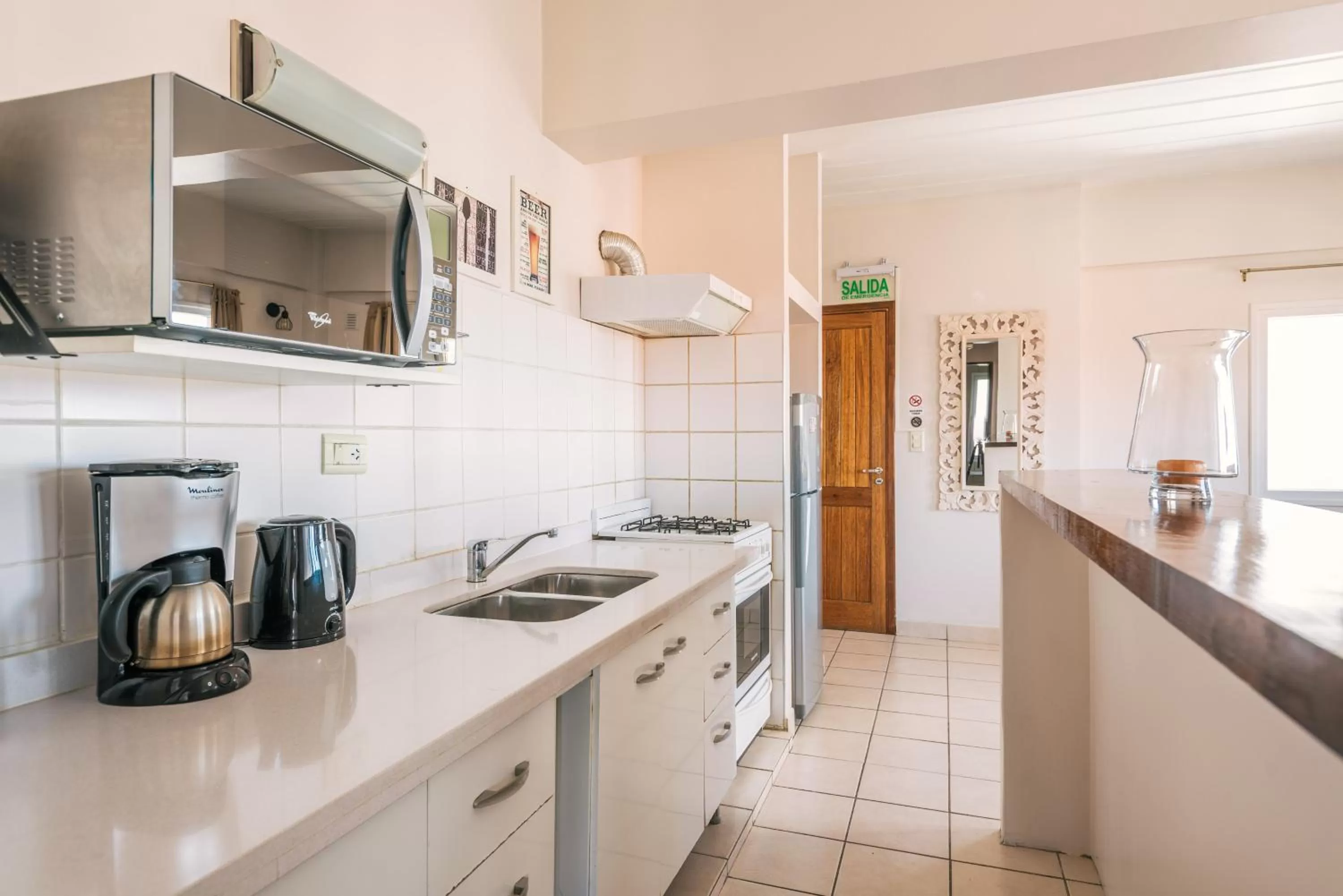Coffee/tea facilities, Kitchen/Kitchenette in Riviera Fueguina Apartments