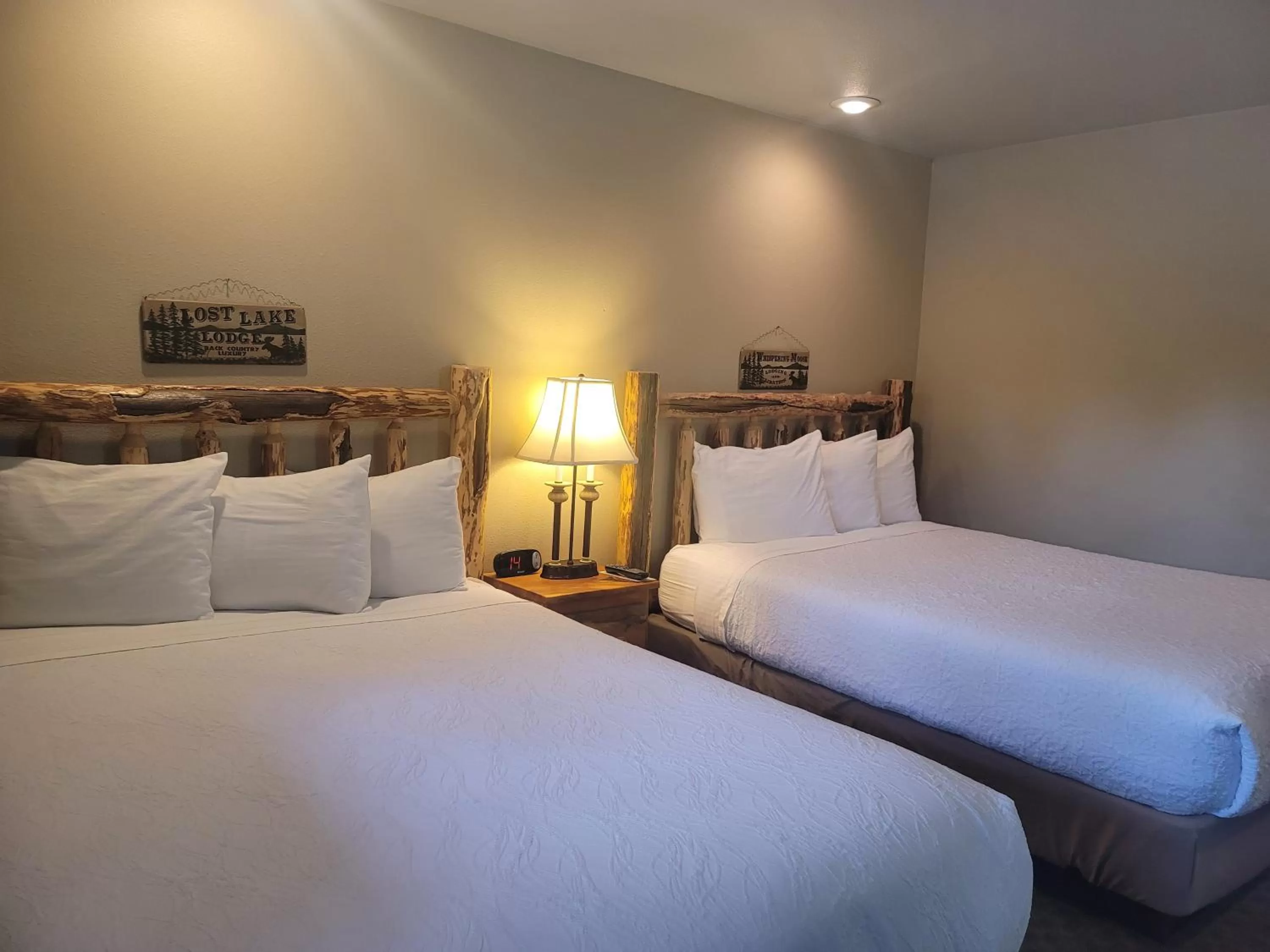 Bed in Riverfront Motel & Cabins