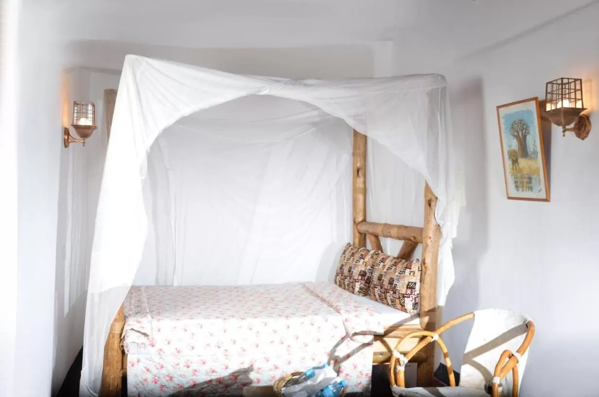 Bed in Charming Eco-Homestay near Kilimanjaro International Airport