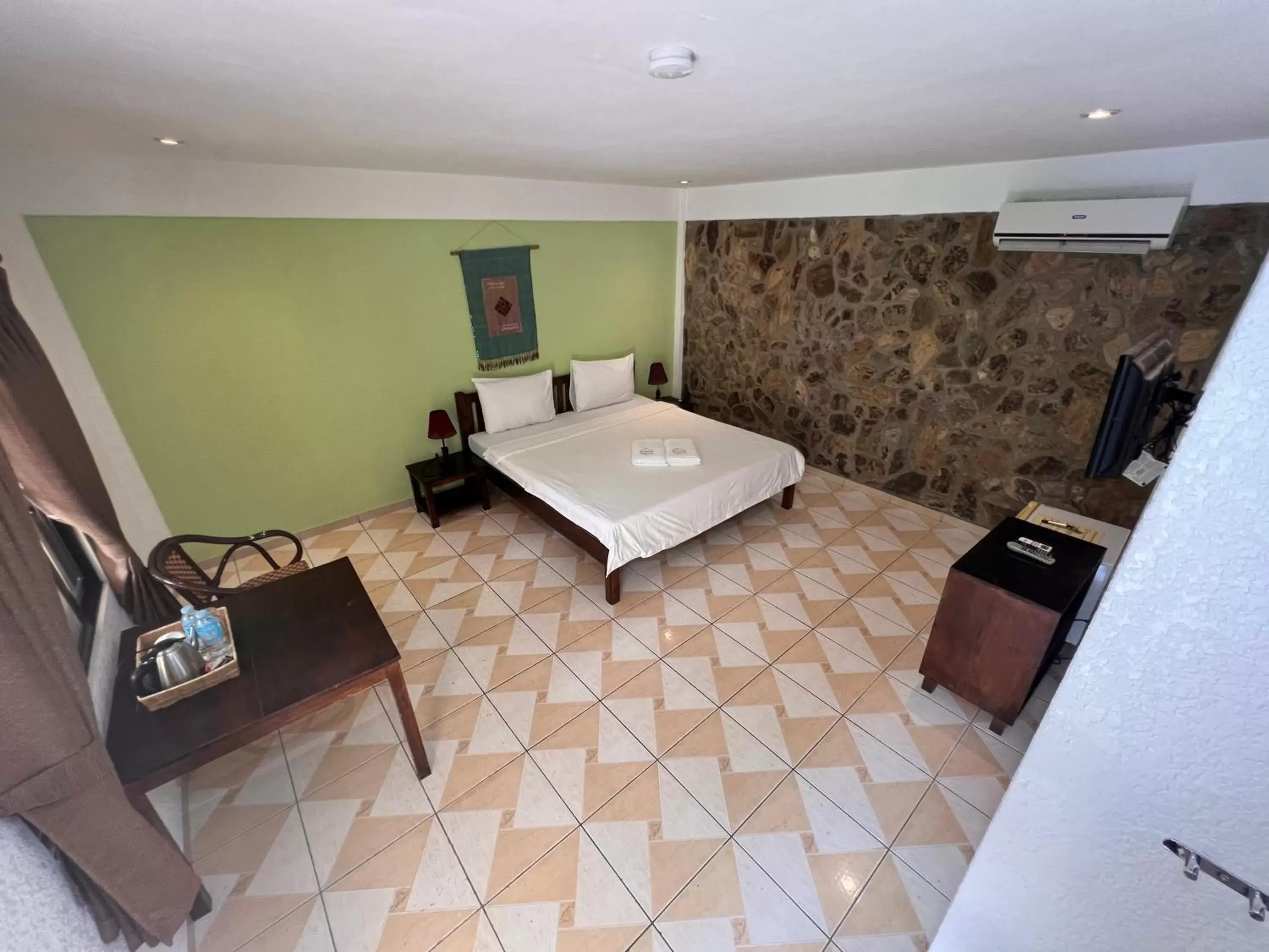 Bed in Alona Swiss Resort Bed in Alona Swiss Resort