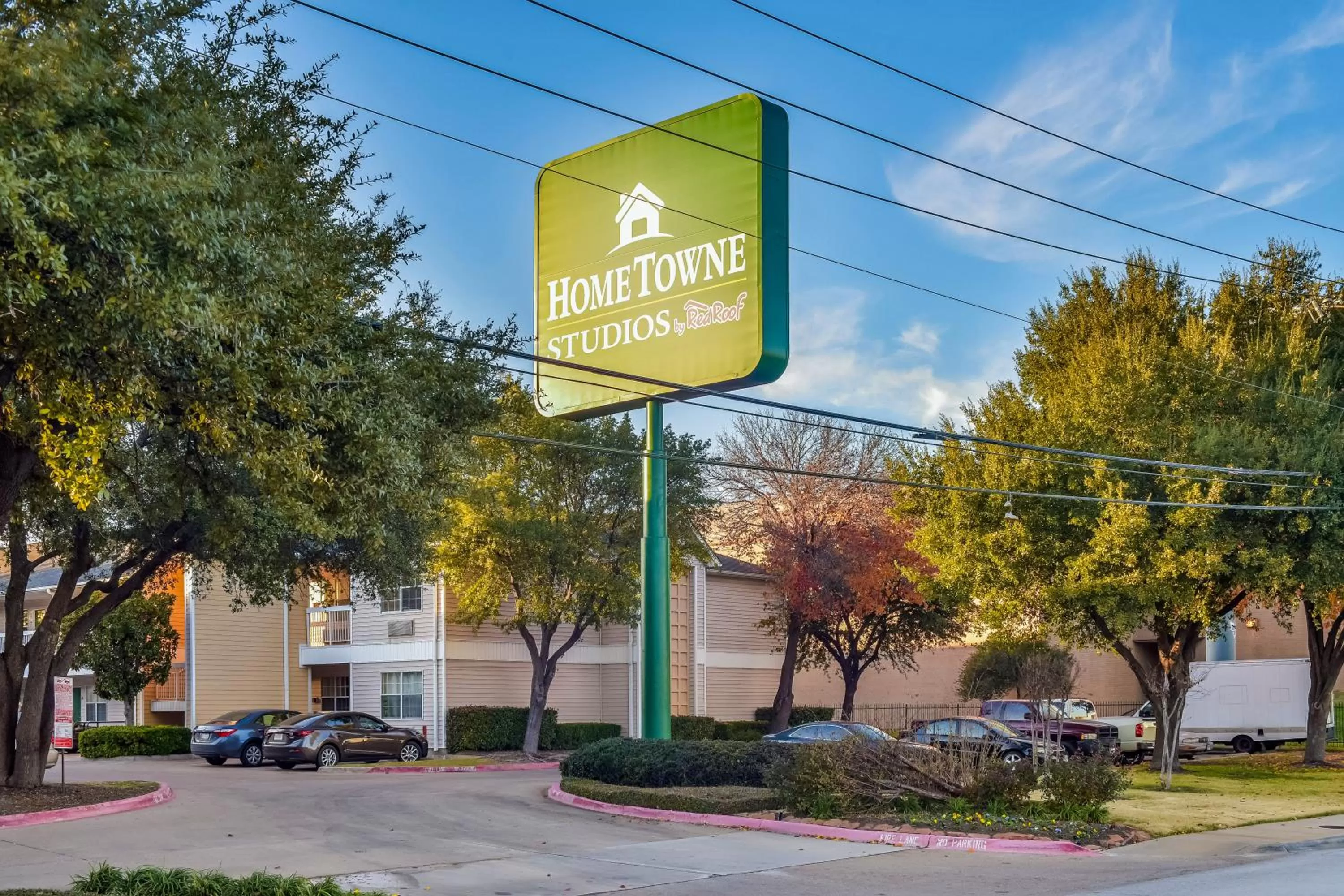 Property building in HomeTowne Studios by Red Roof Dallas - North Addison - Tollway