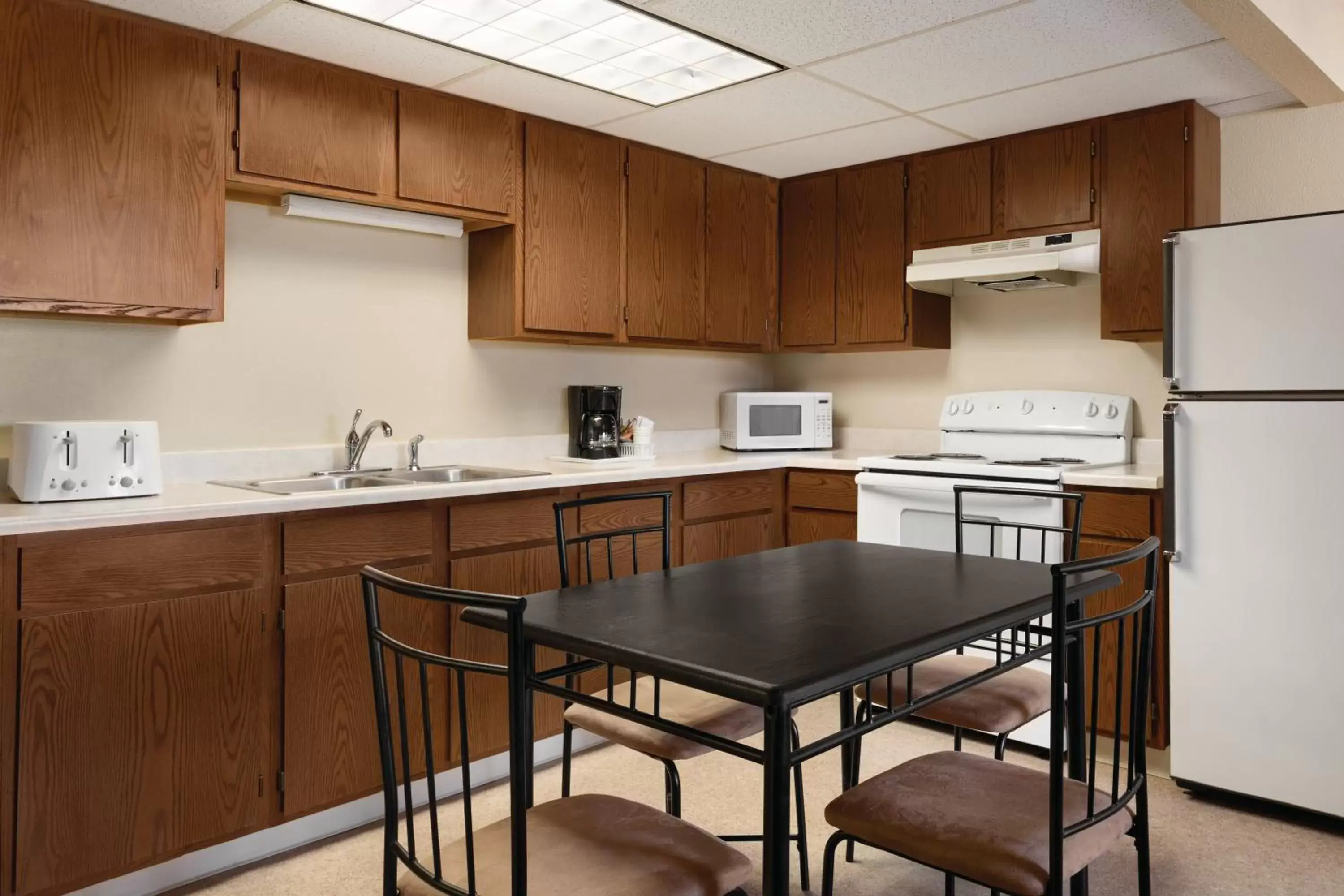 Kitchen or kitchenette, Kitchen/Kitchenette in Super 8 by Wyndham Columbus