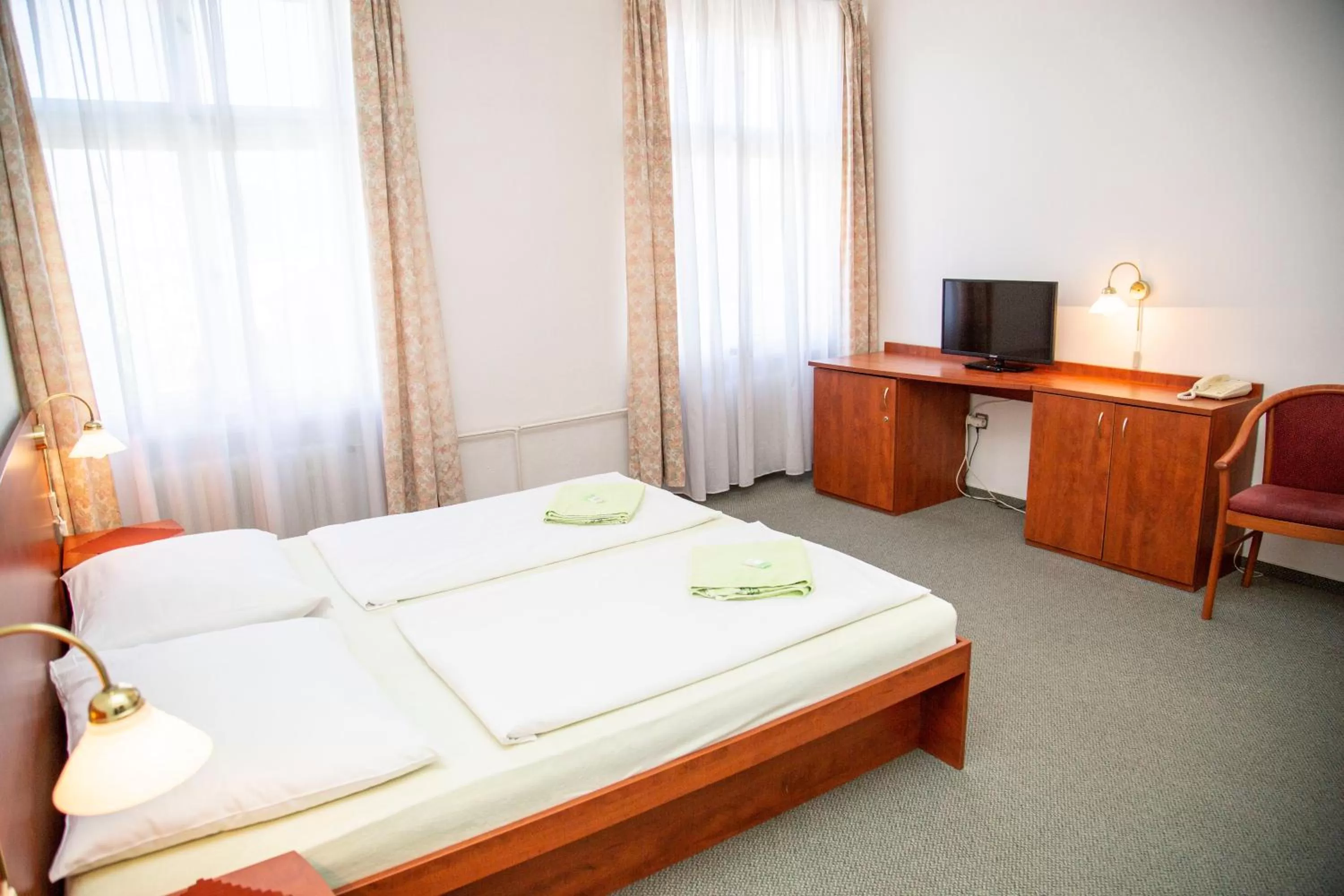 Living room, Bed in Wellness Hotel Central