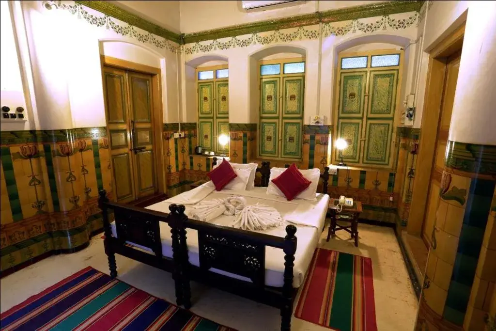 Bed in Chettinadu Mansion – An Authentic Heritage Palace