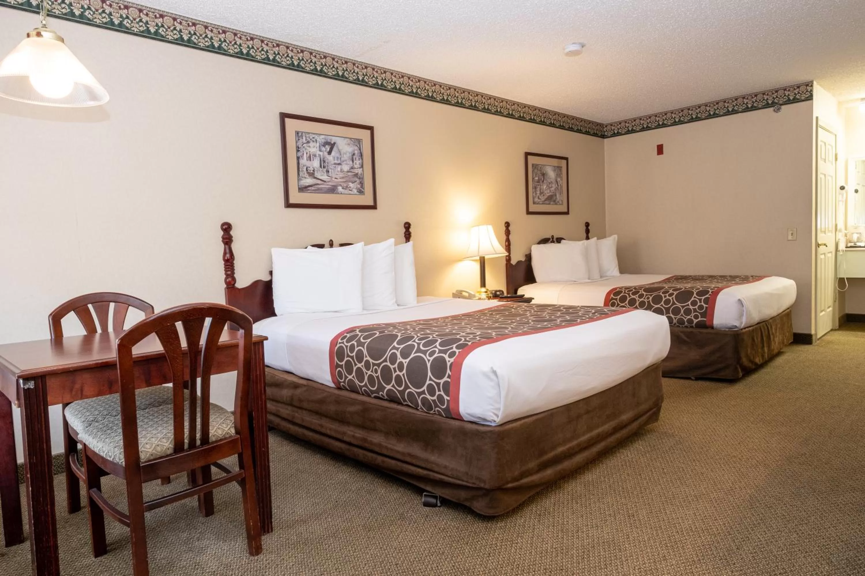 Photo of the whole room, Bed in Hilltop Inn & Suites, near Foxwoods Casino