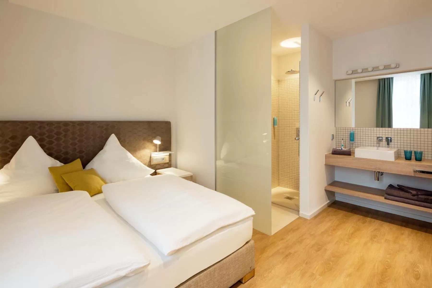 Photo of the whole room, Bed in Goldkind Feine Wohn- & Schlafstuben