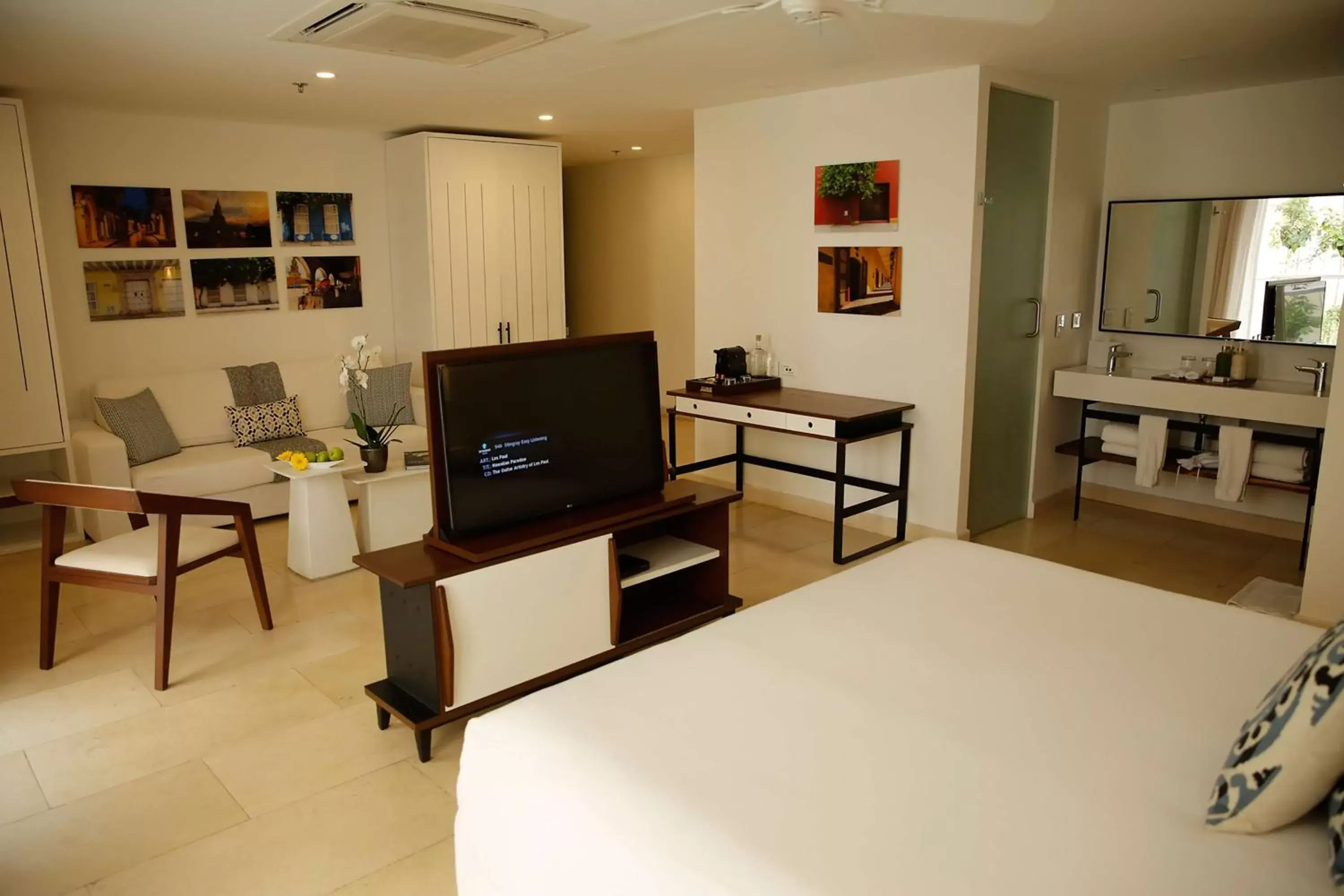 Bedroom, TV/Entertainment Center in Nacar Hotel Cartagena, Curio Collection by Hilton