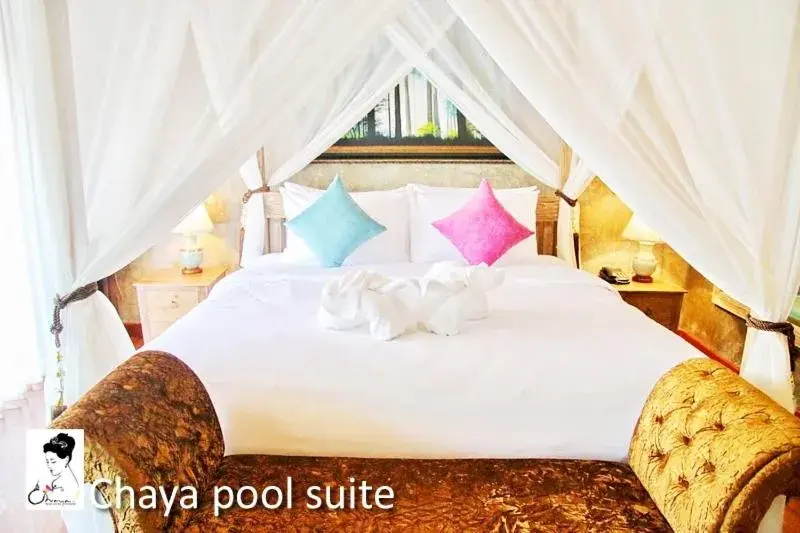 Bed in The Chaya Resort and Spa