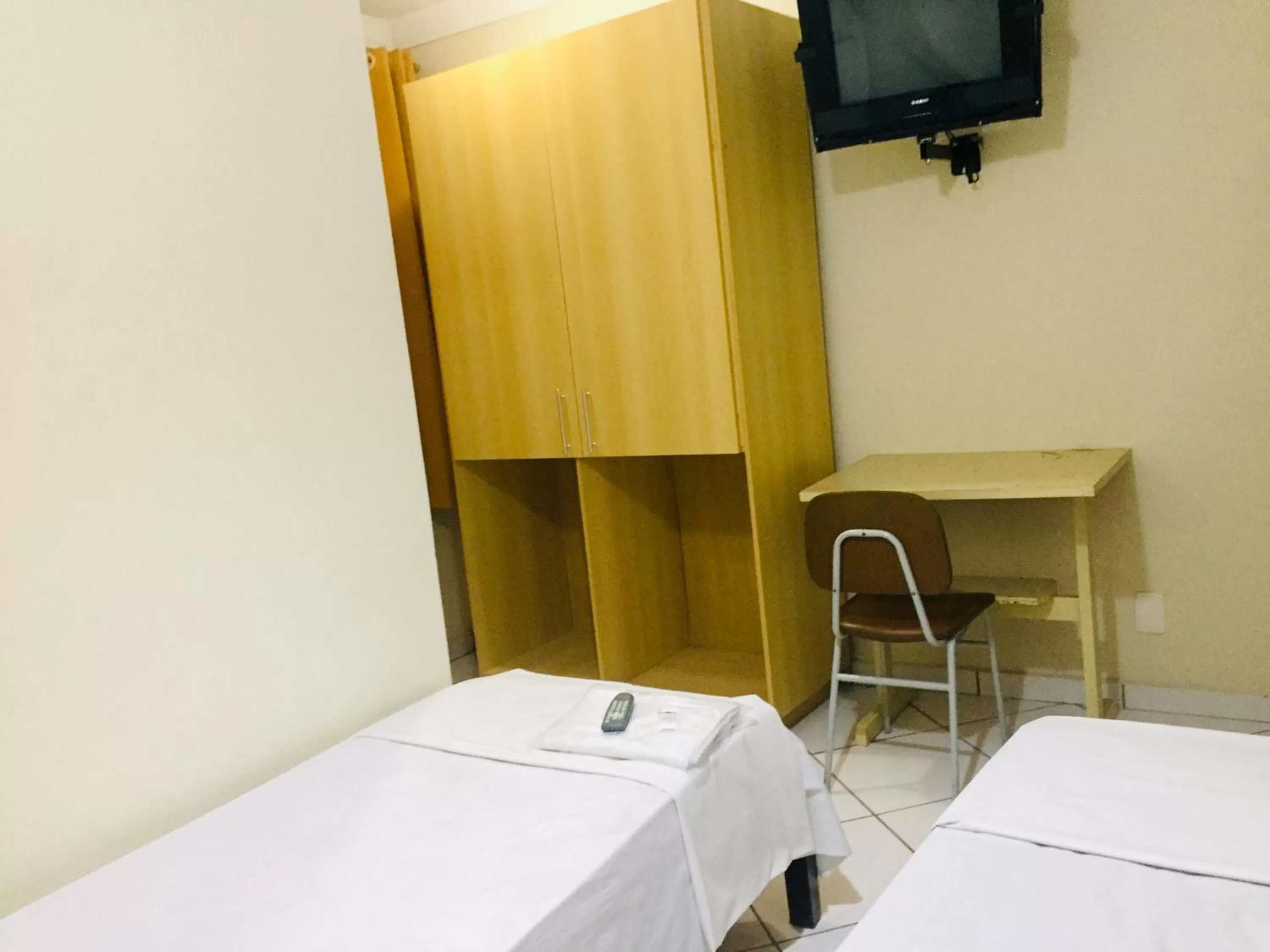 Bed in Hotel Oliveira