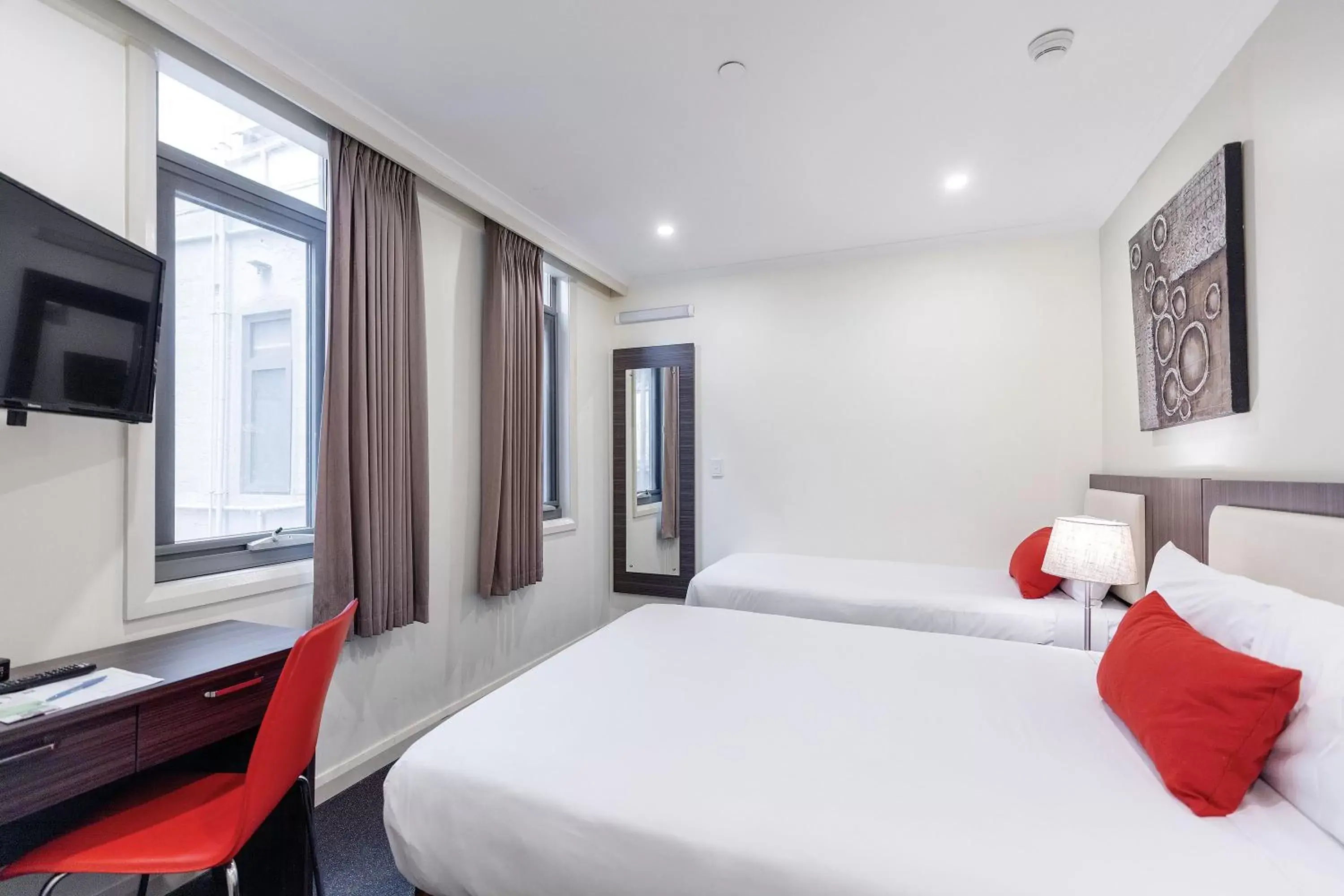 Standard Room with one double and one single bed in ibis Styles Kingsgate Hotel