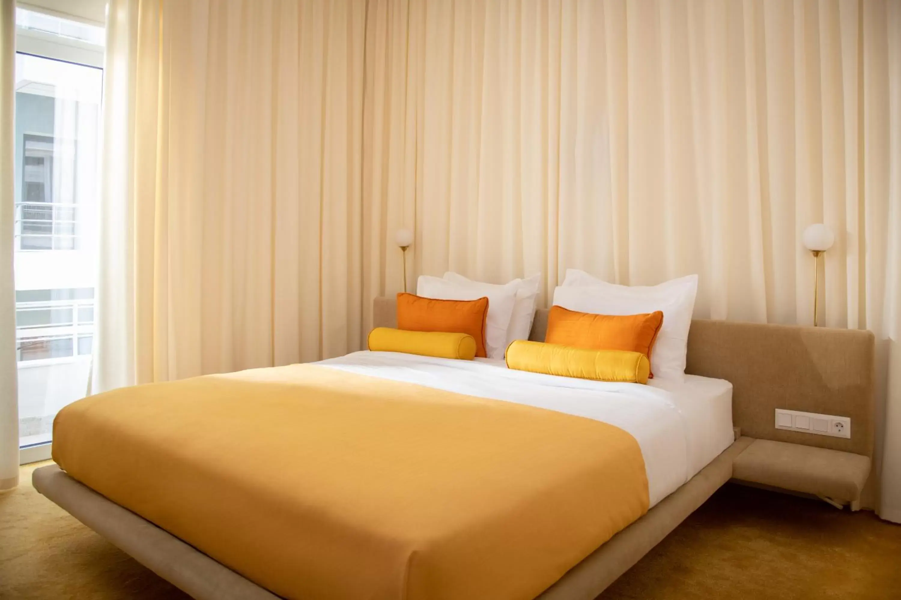 Bed in Apollo Palm Hotel