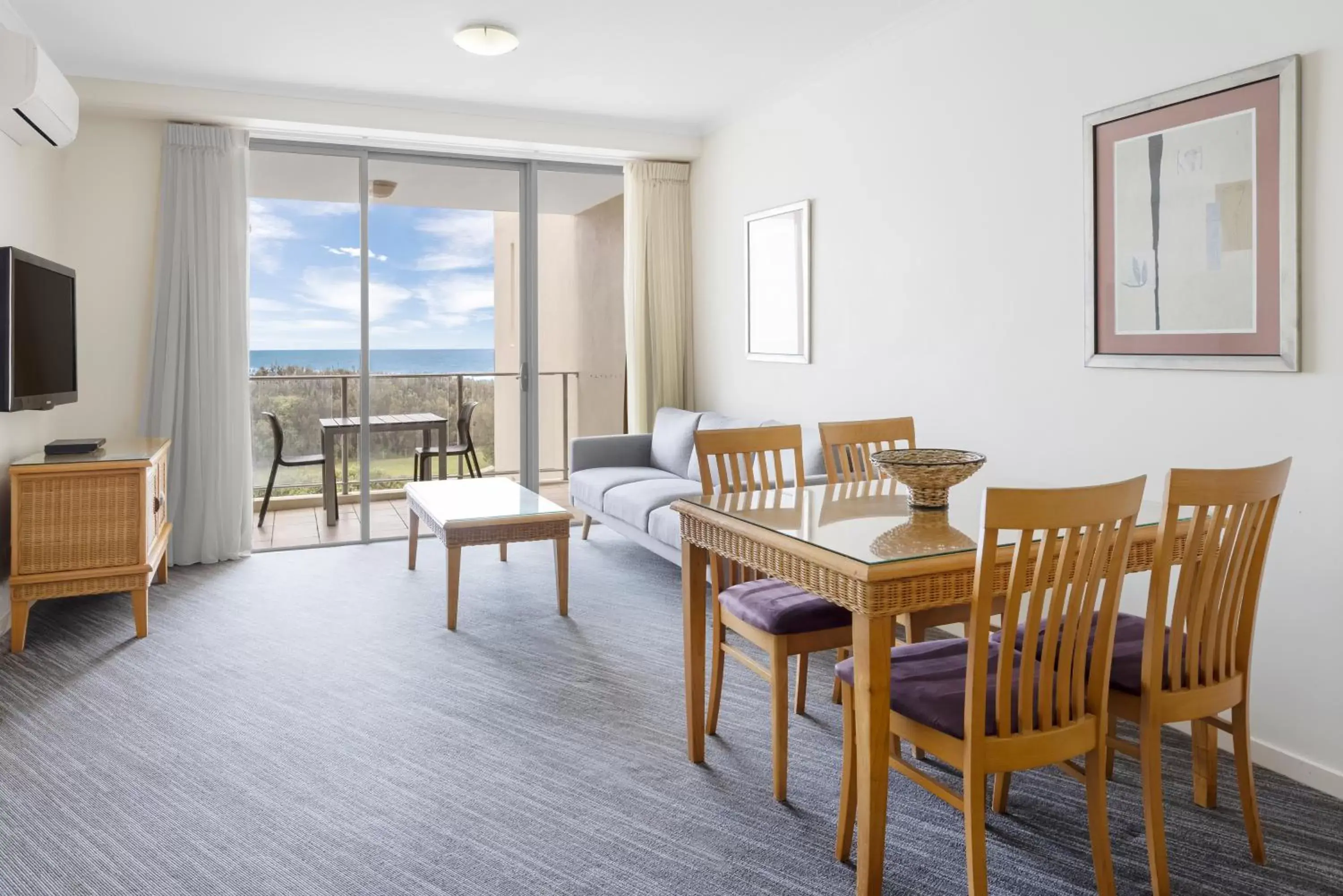 Living room, Dining Area in Ramada By Wyndham Marcoola Beach