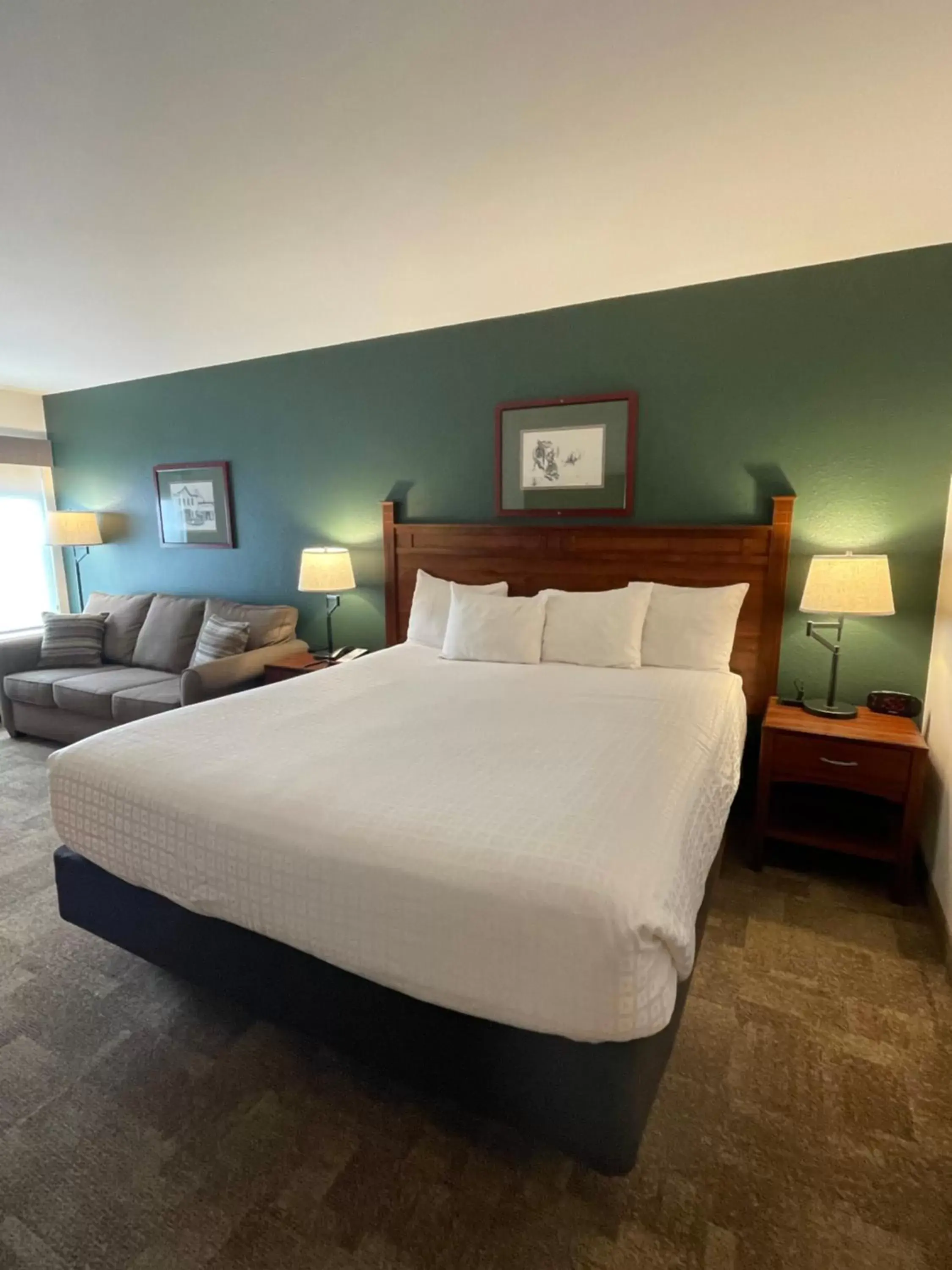 Bedroom, Bed in Boothill Inn and Suites