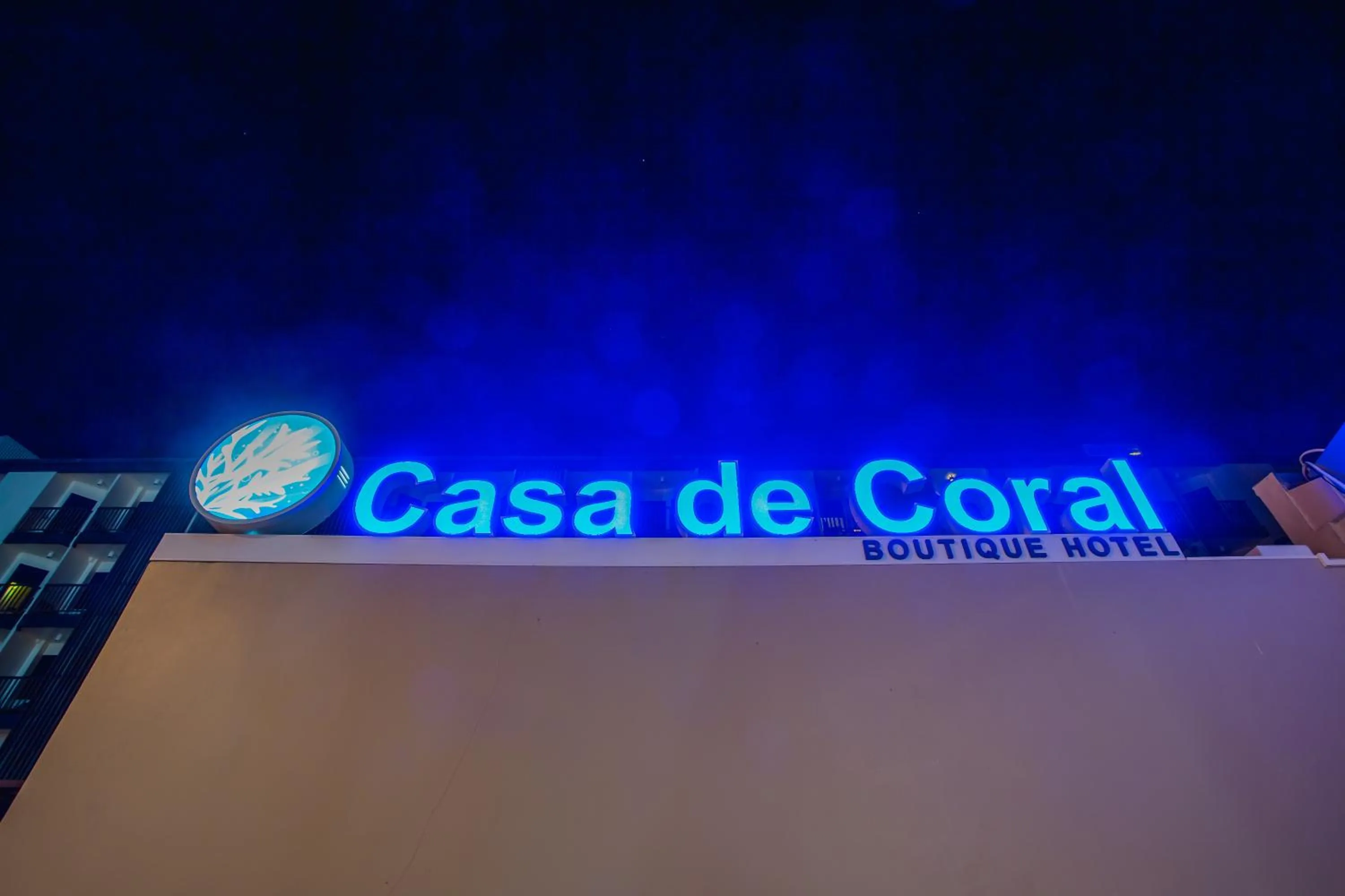 Property logo or sign in Casa de Coral Boutique Hotel