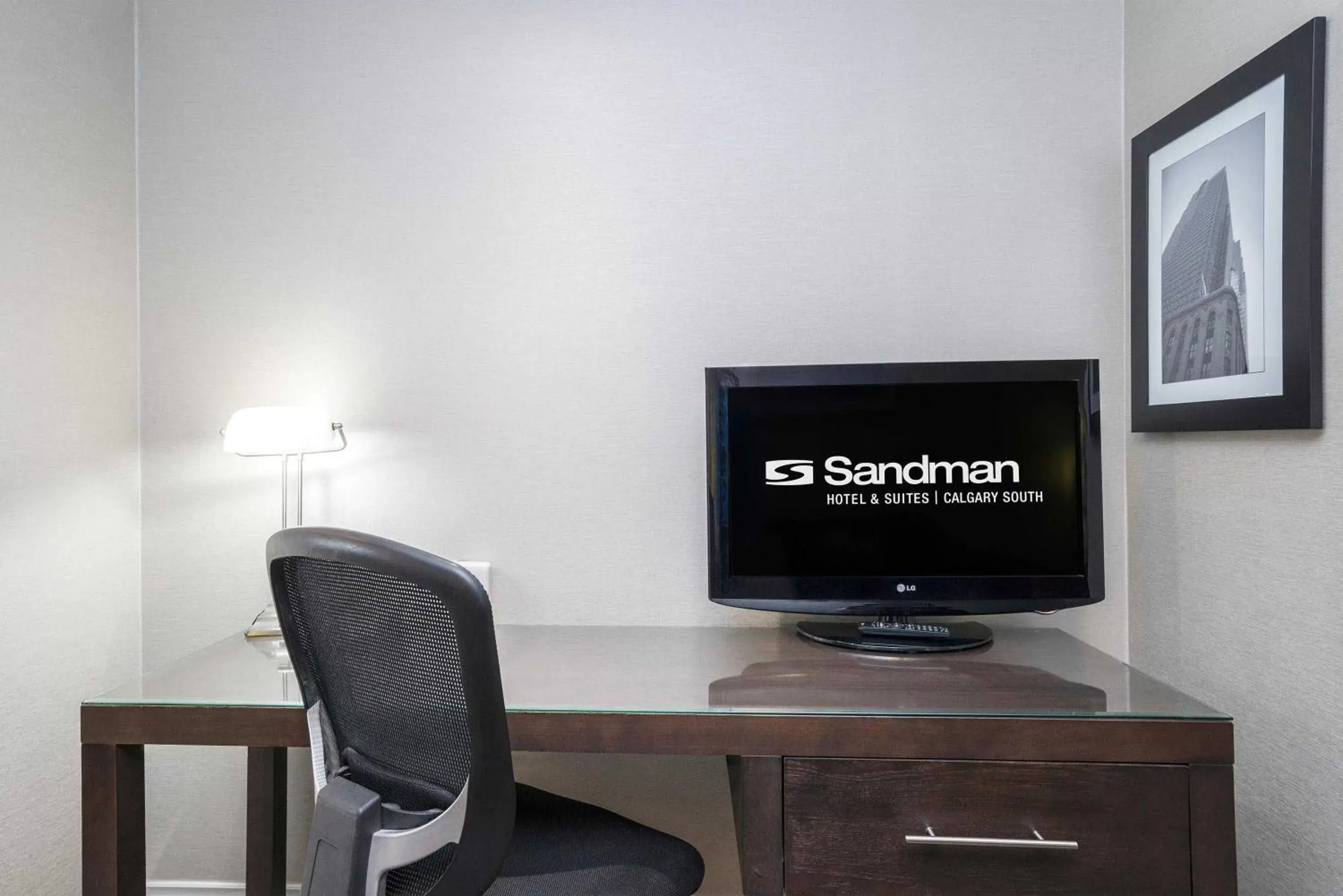 TV and multimedia, TV/Entertainment Center in Sandman Hotel & Suites Calgary South