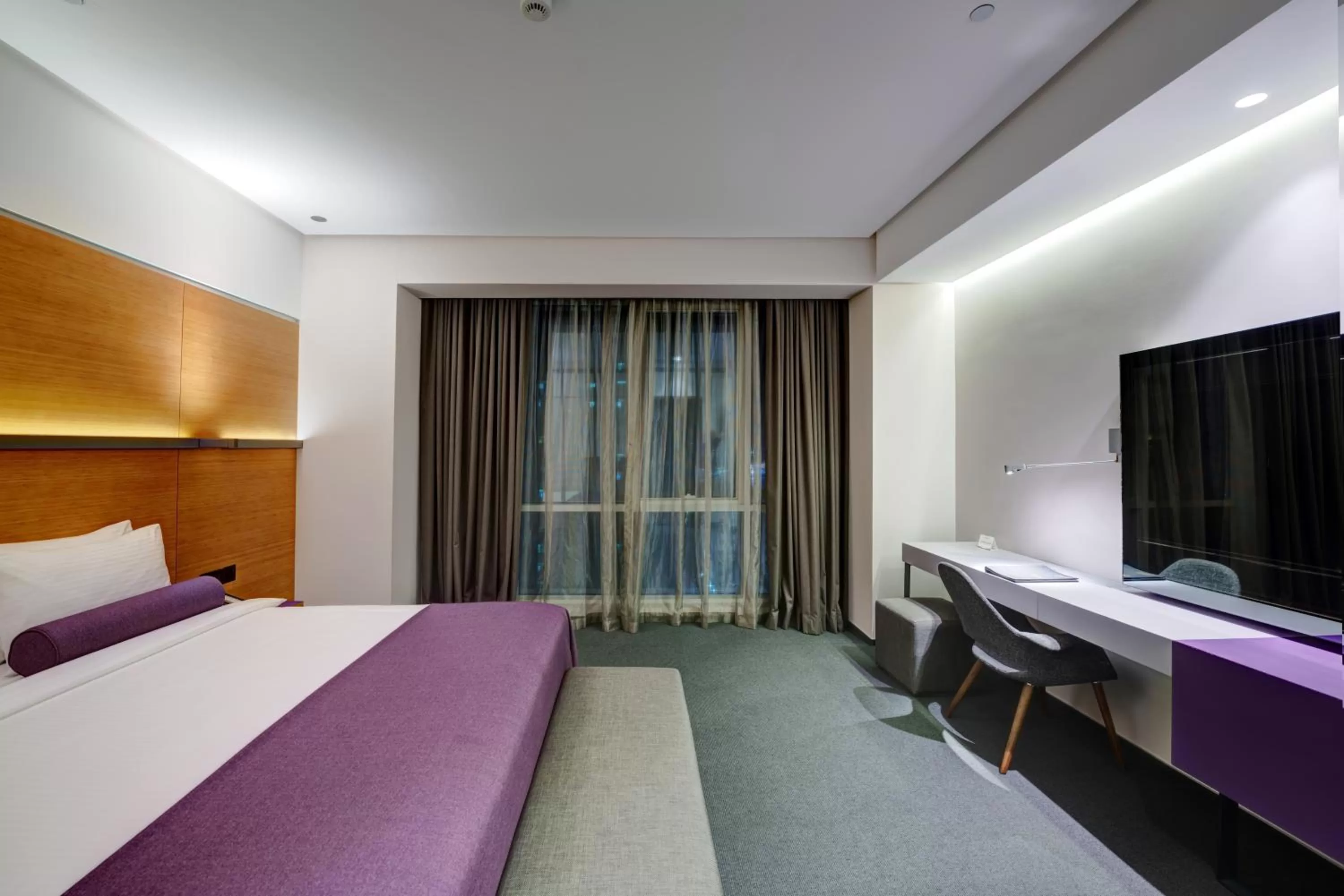 View (from property/room), Bed in The Act Hotel Sharjah