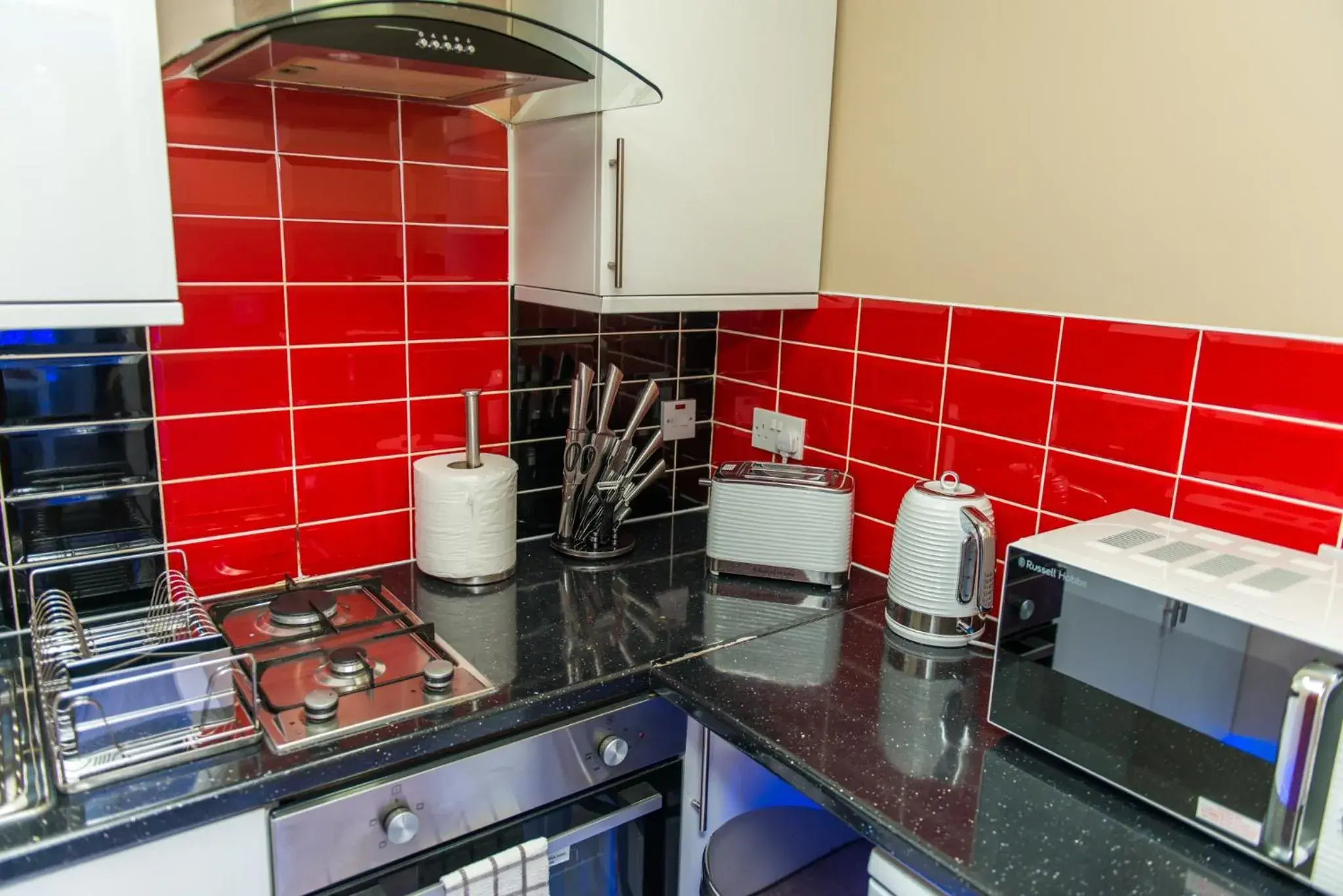 Kitchen/Kitchenette in Meridian Serviced Apartments