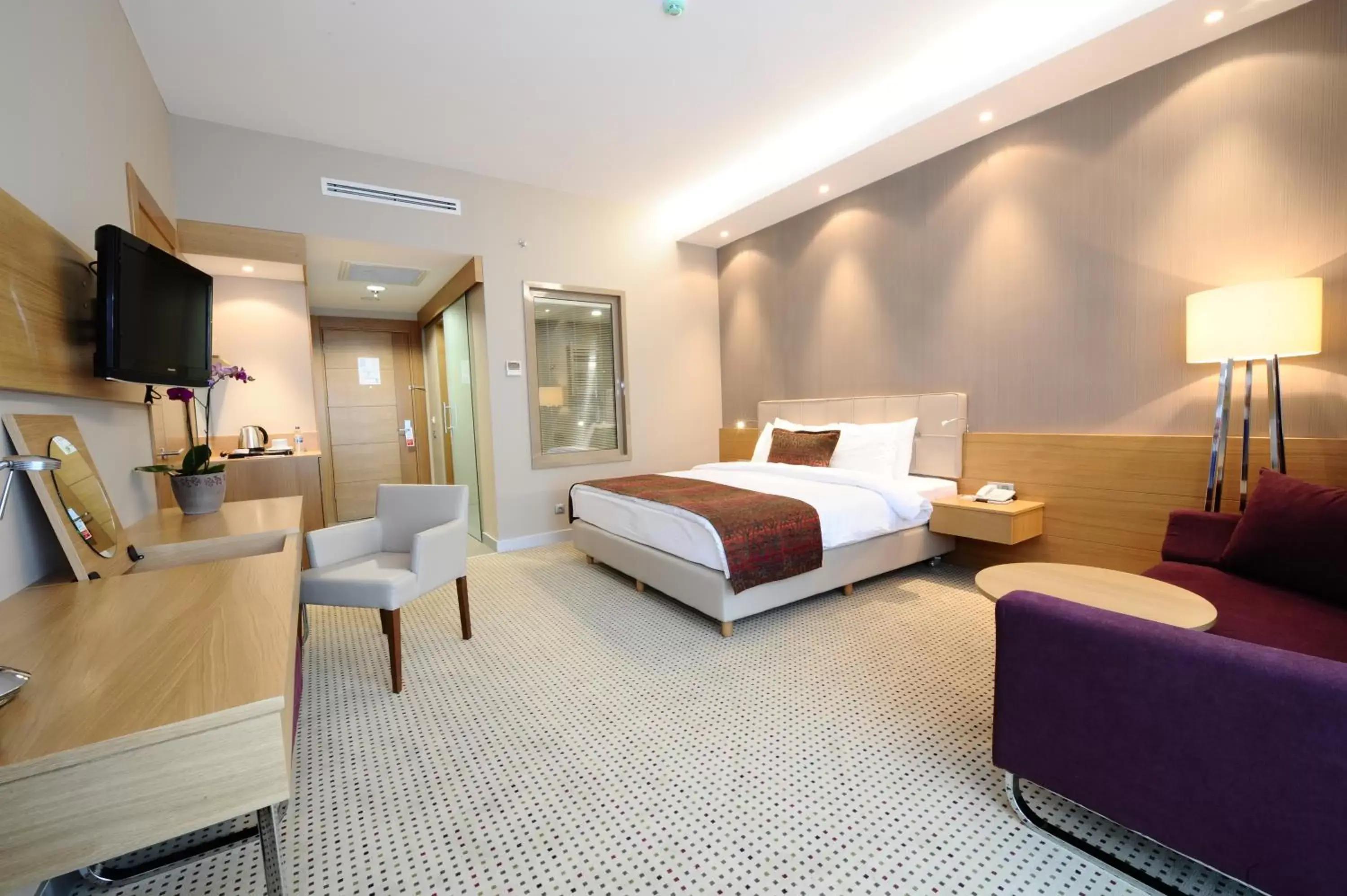 Photo of the whole room, Bed in Ramada by Wyndham Podgorica Photo of the whole room, Bed in Ramada by Wyndham Podgorica