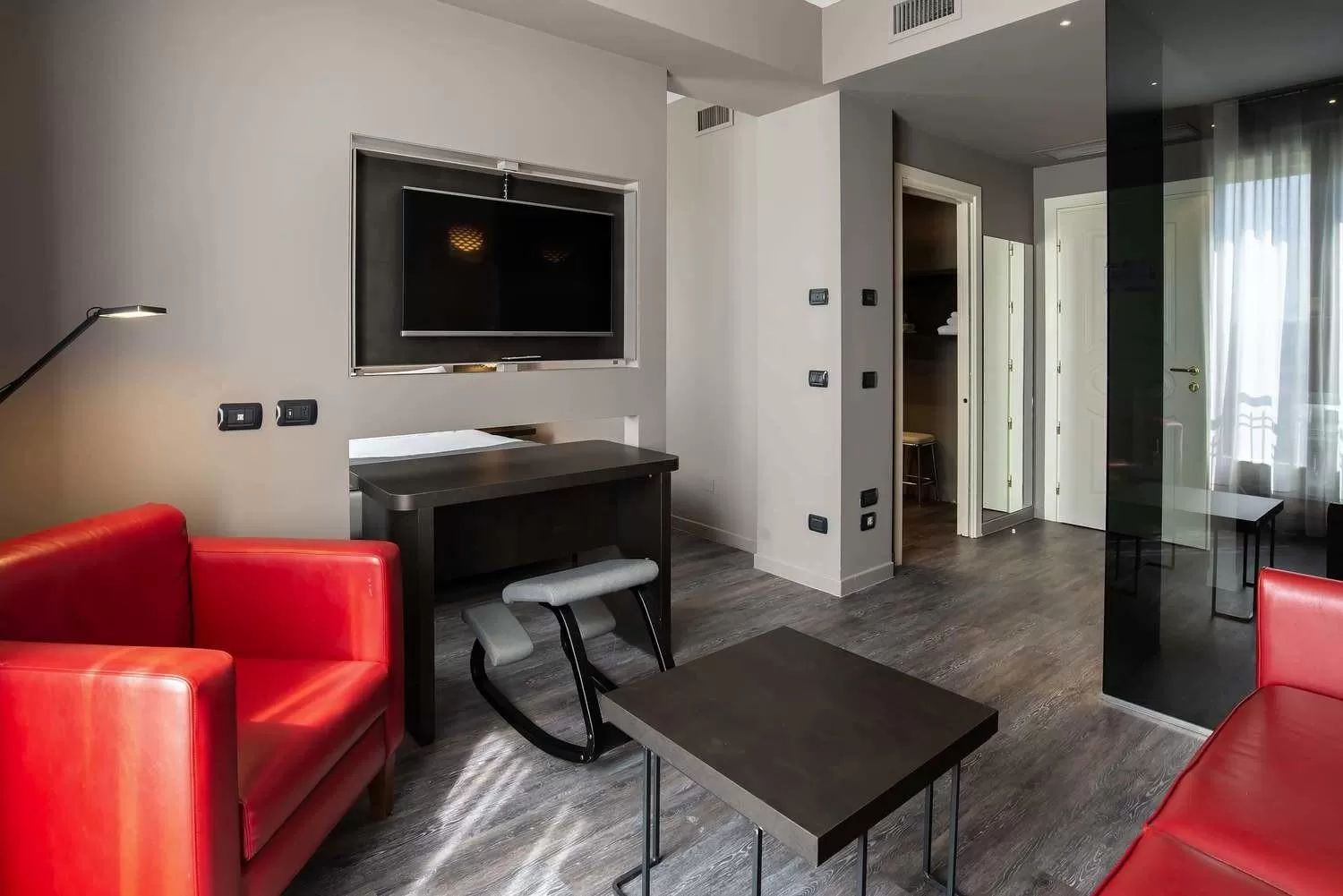 Communal lounge/ TV room in Maranello Palace