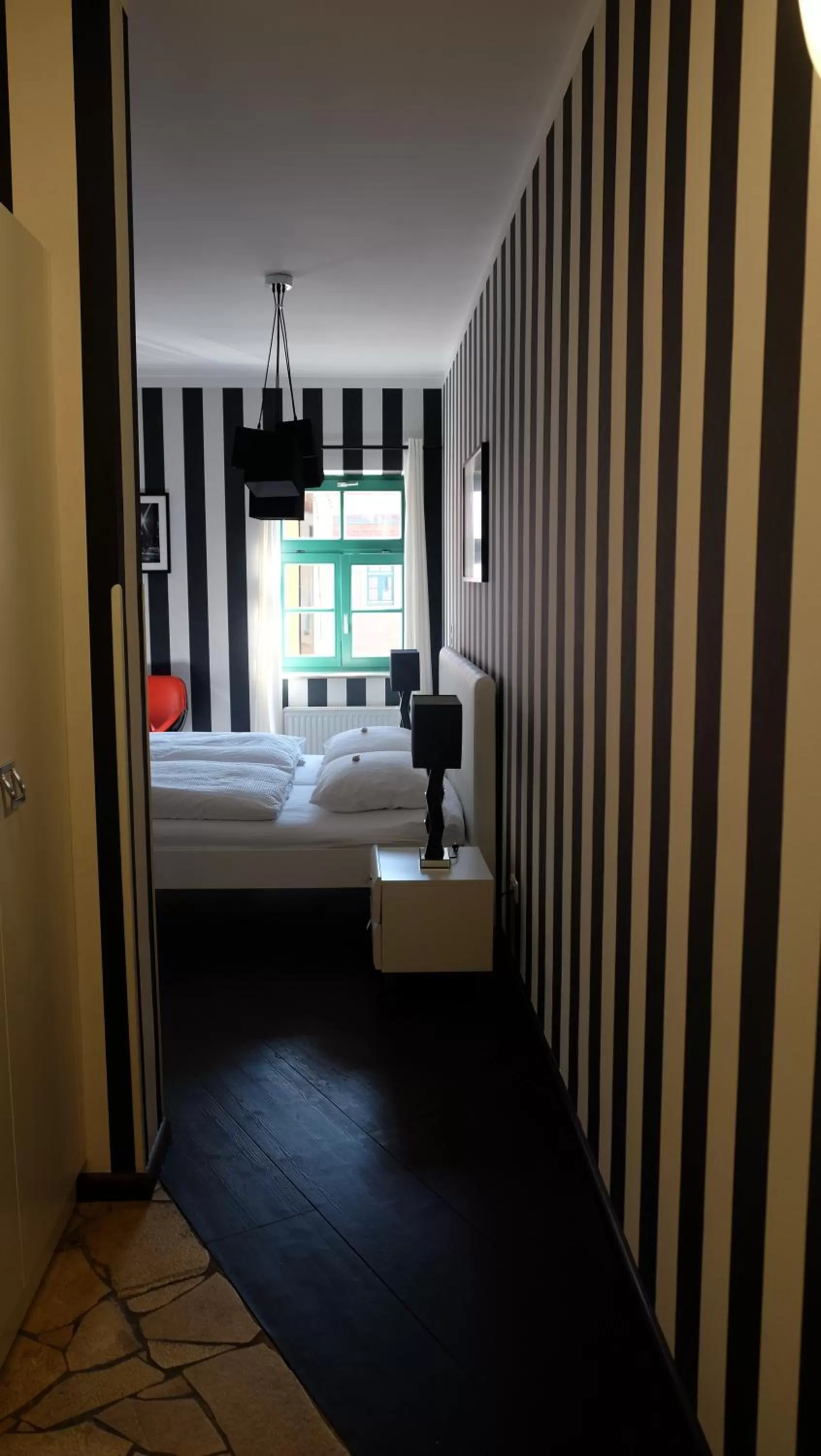 Living room, Bed in Backstage Hotel