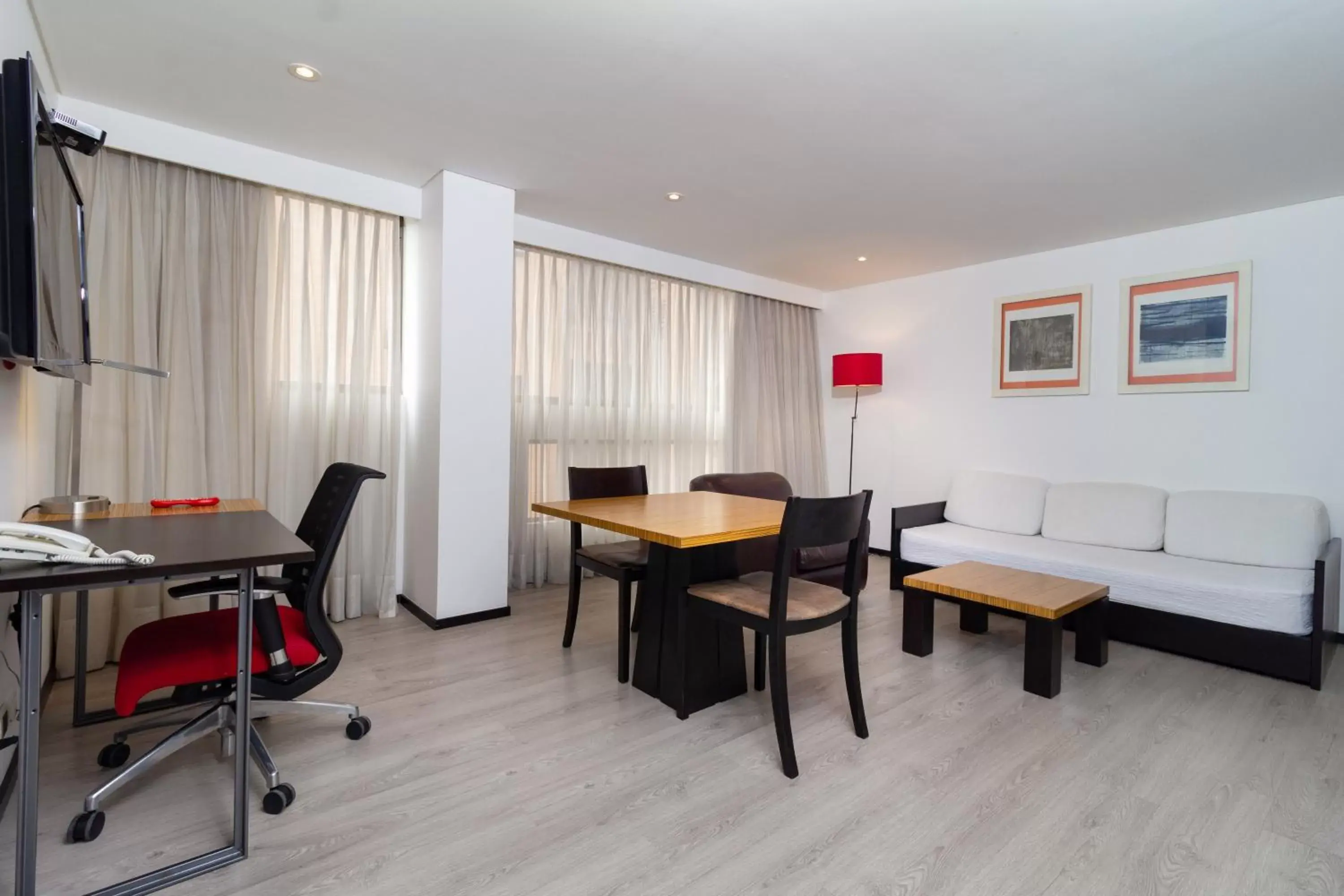 Living room in Hotel Madisson Inn Luxury By GEH Suites