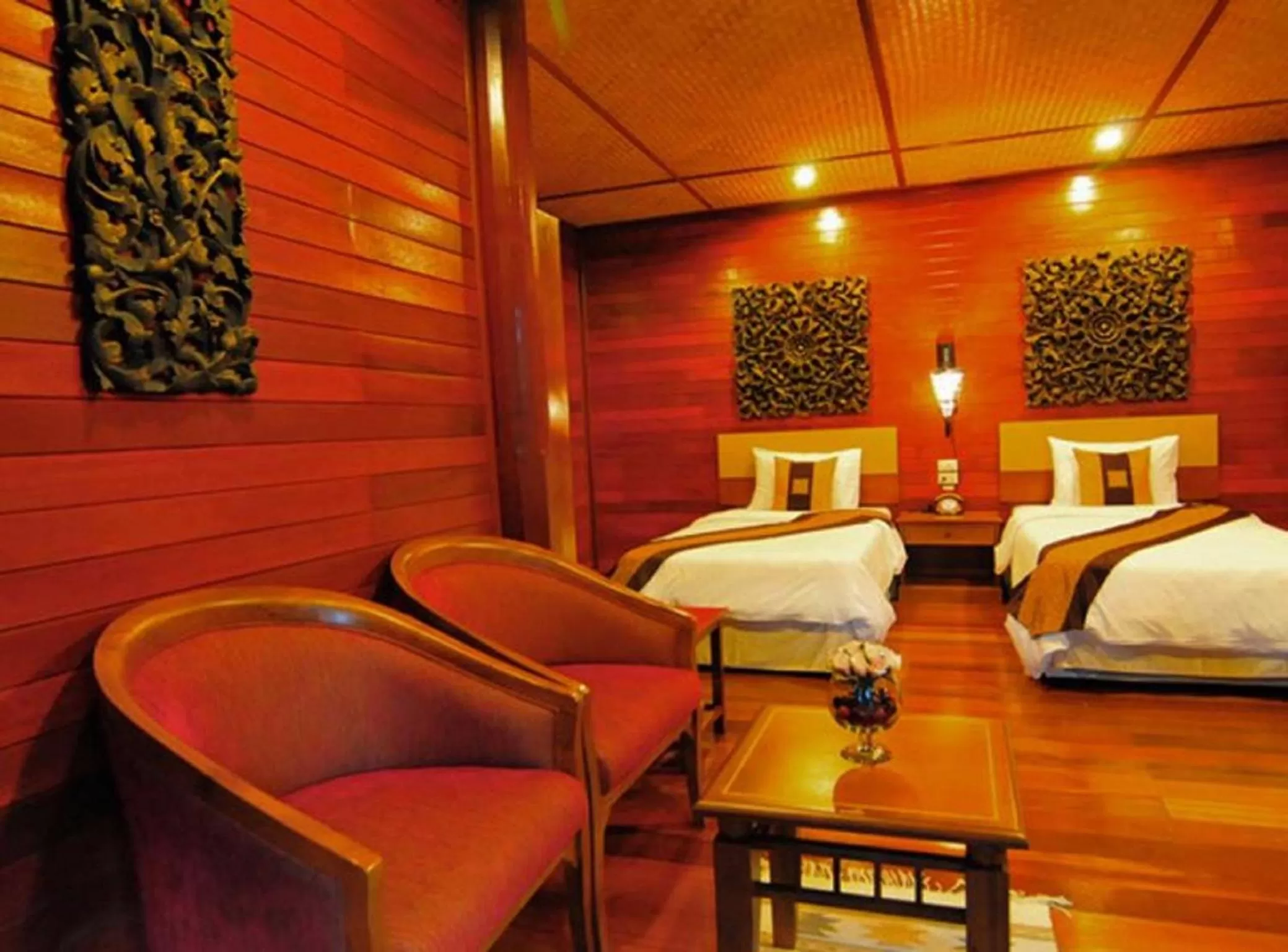 Bed in Ruenkanok Thaihouse Resort