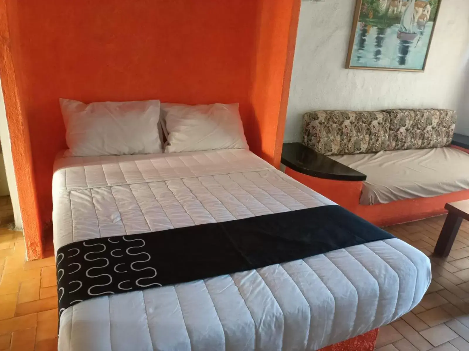 Bed in hotel plaza tucanes