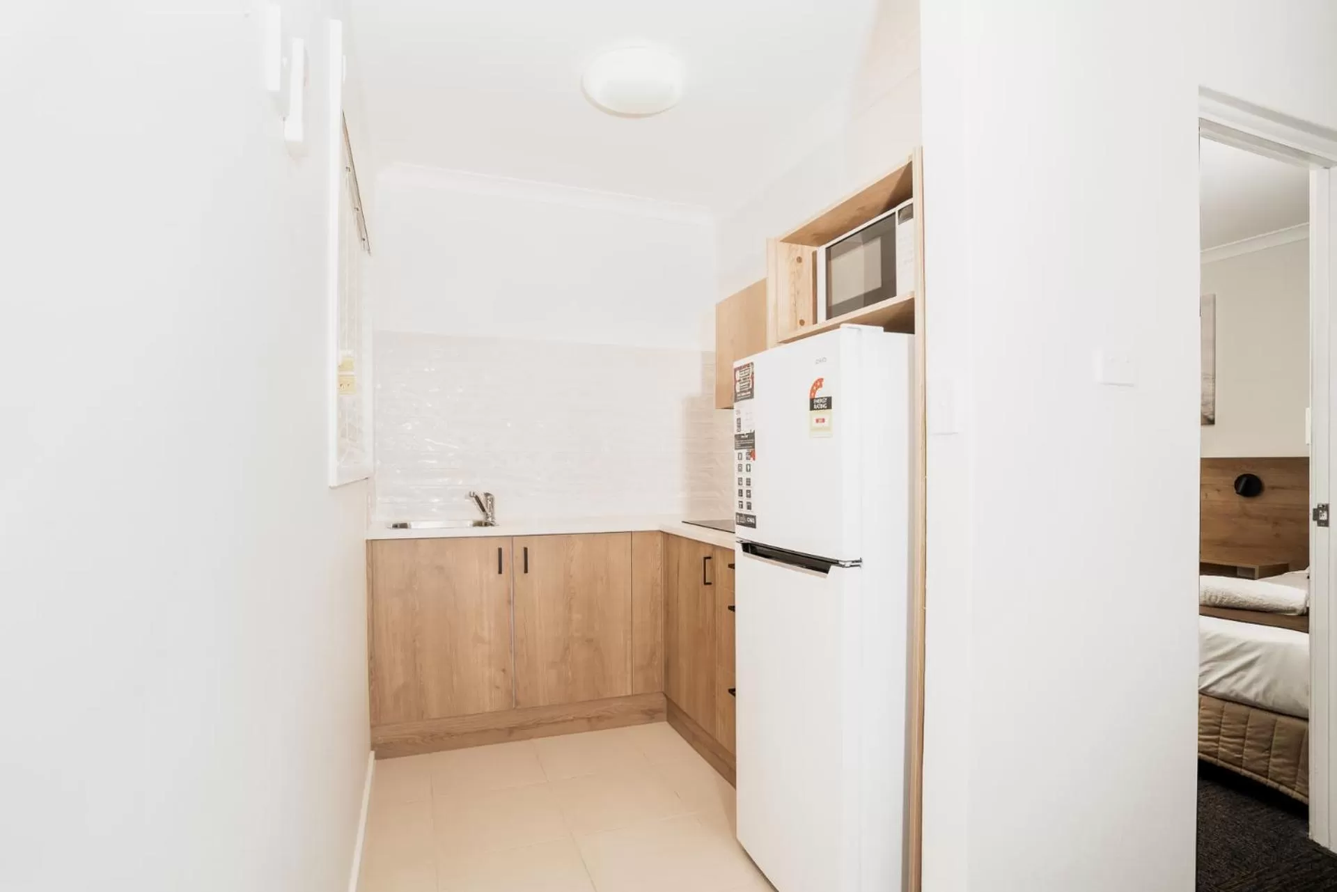 Kitchen or kitchenette in Caribbean Motel