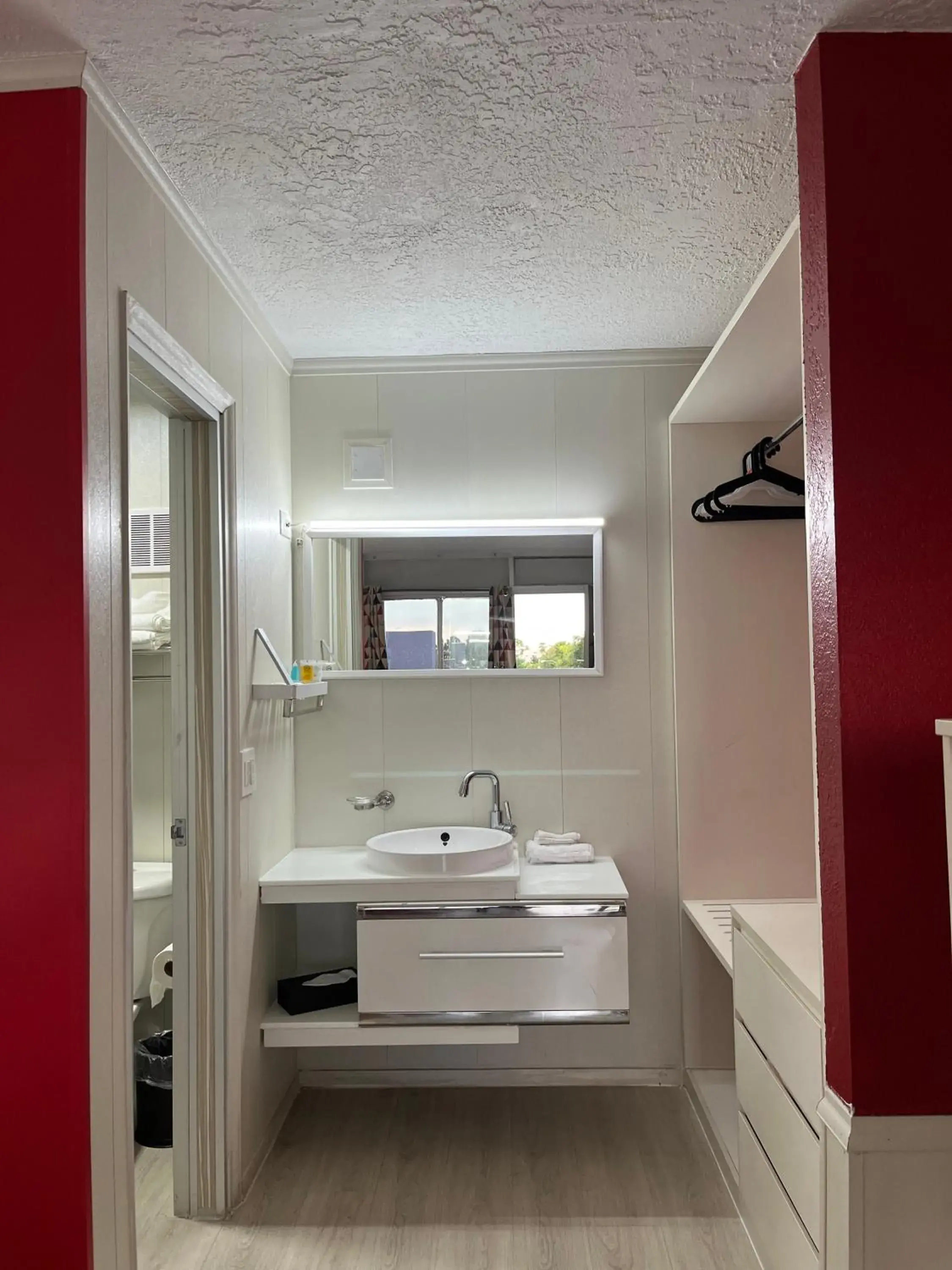 Bathroom in Travelodge by Wyndham Orlando at Heart of International Drive