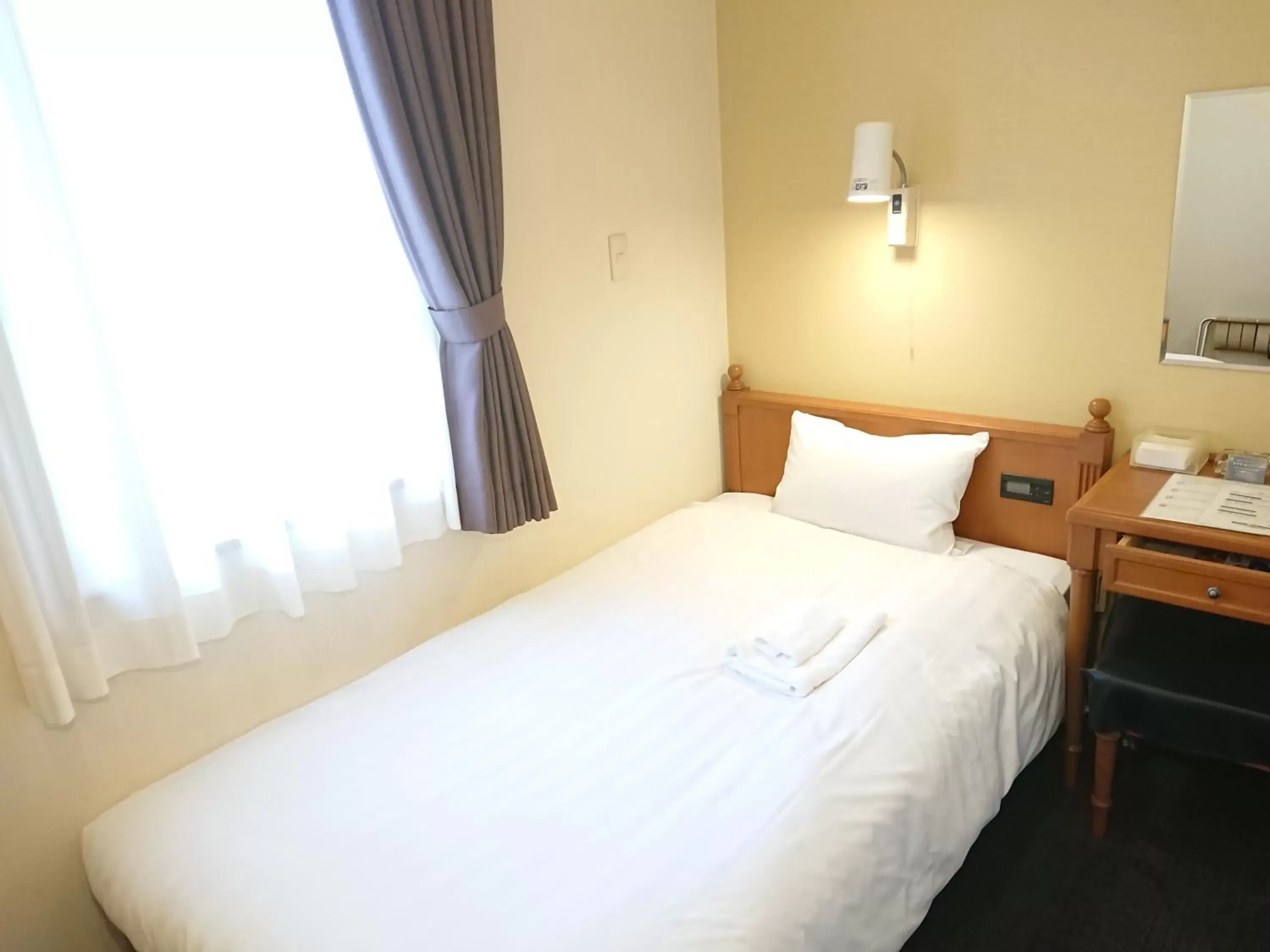 Photo of the whole room, Bed in Smile Hotel Kobe Motomachi