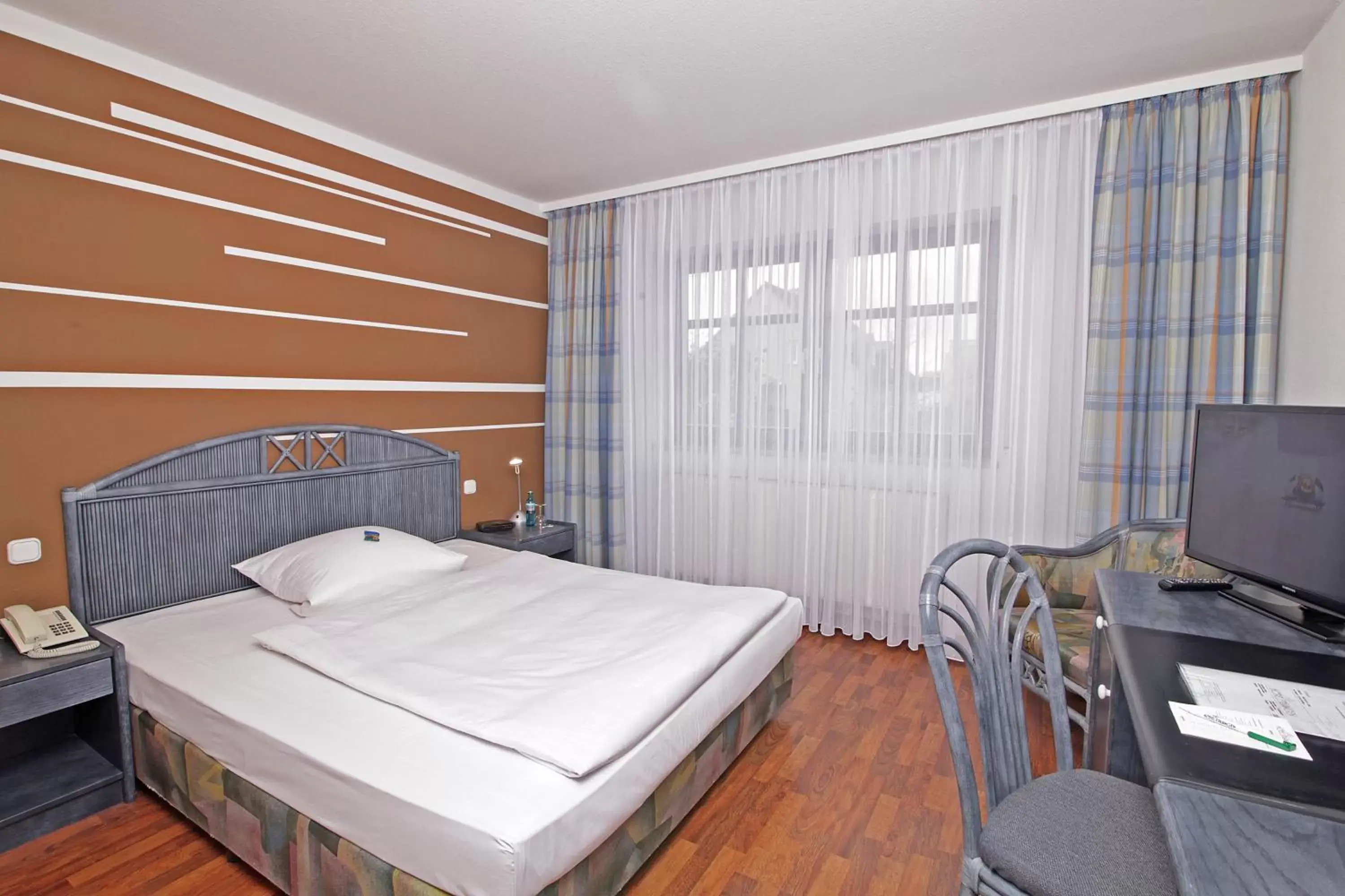 TV and multimedia, Bed in Art-Hotel Erlangen TV and multimedia, Bed in Art-Hotel Erlangen