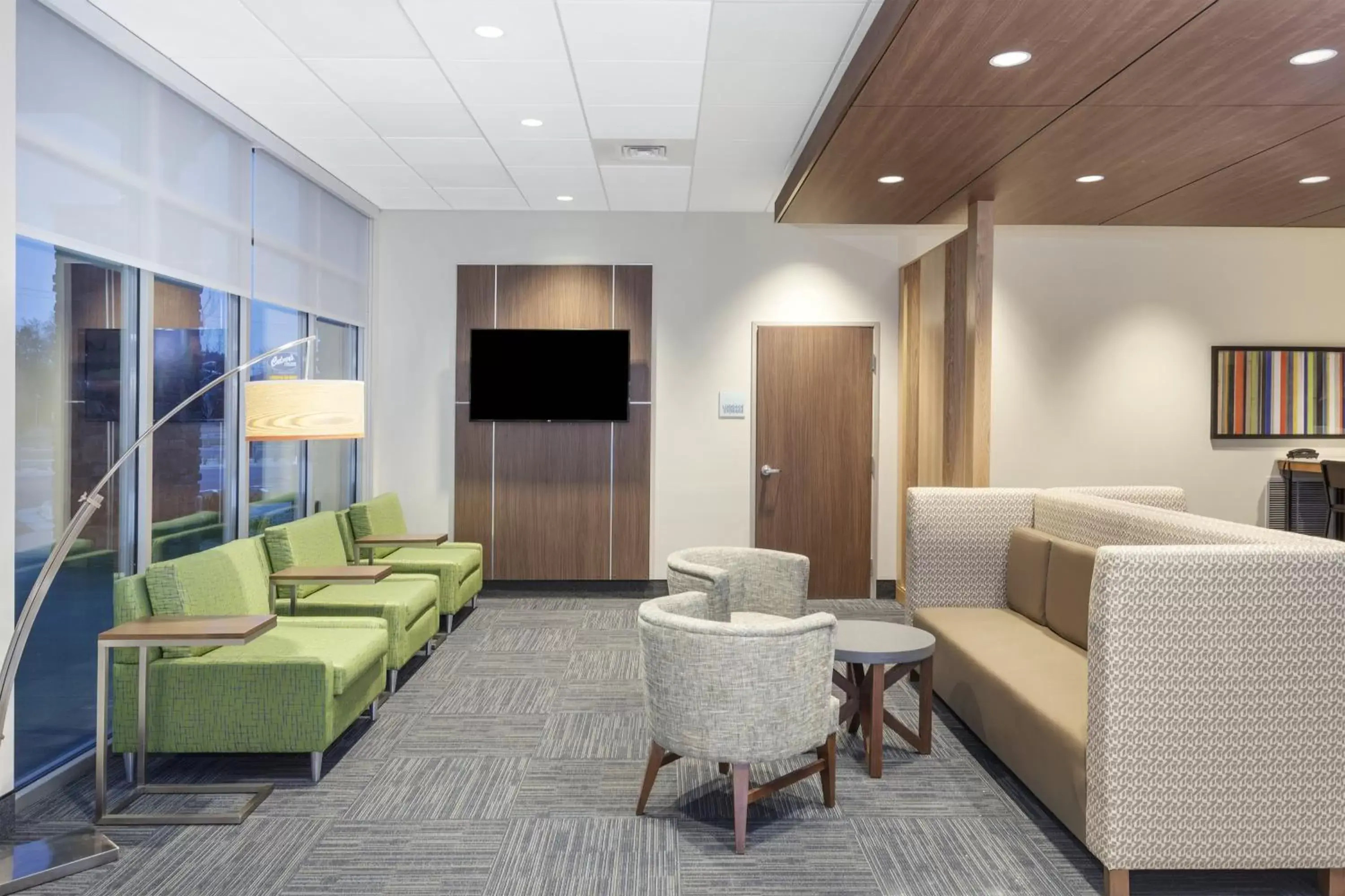 Property building, Seating Area in Holiday Inn Express & Suites - Hudson I-94, an IHG Hotel
