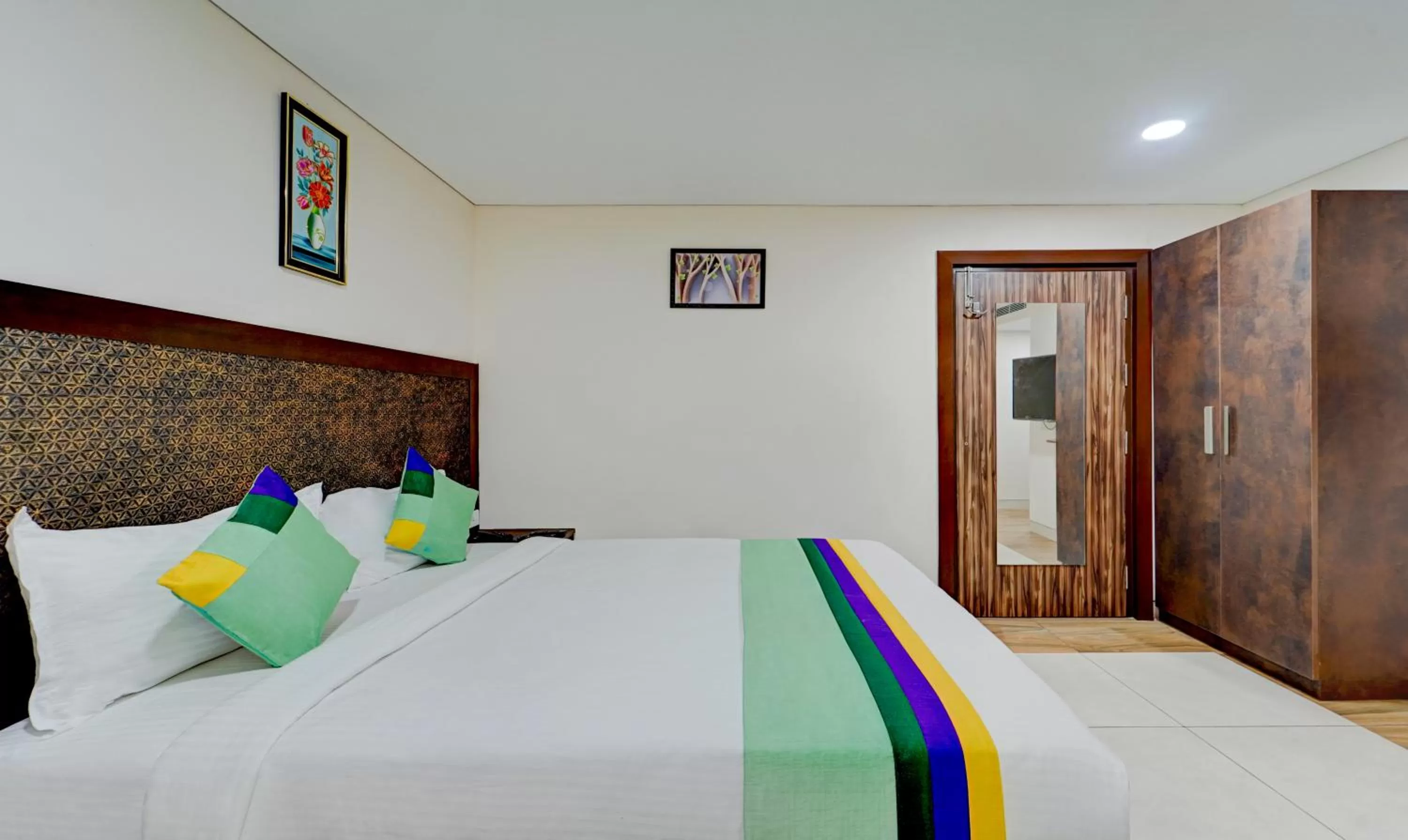 Bed in Treebo Vetri Supreme Residency