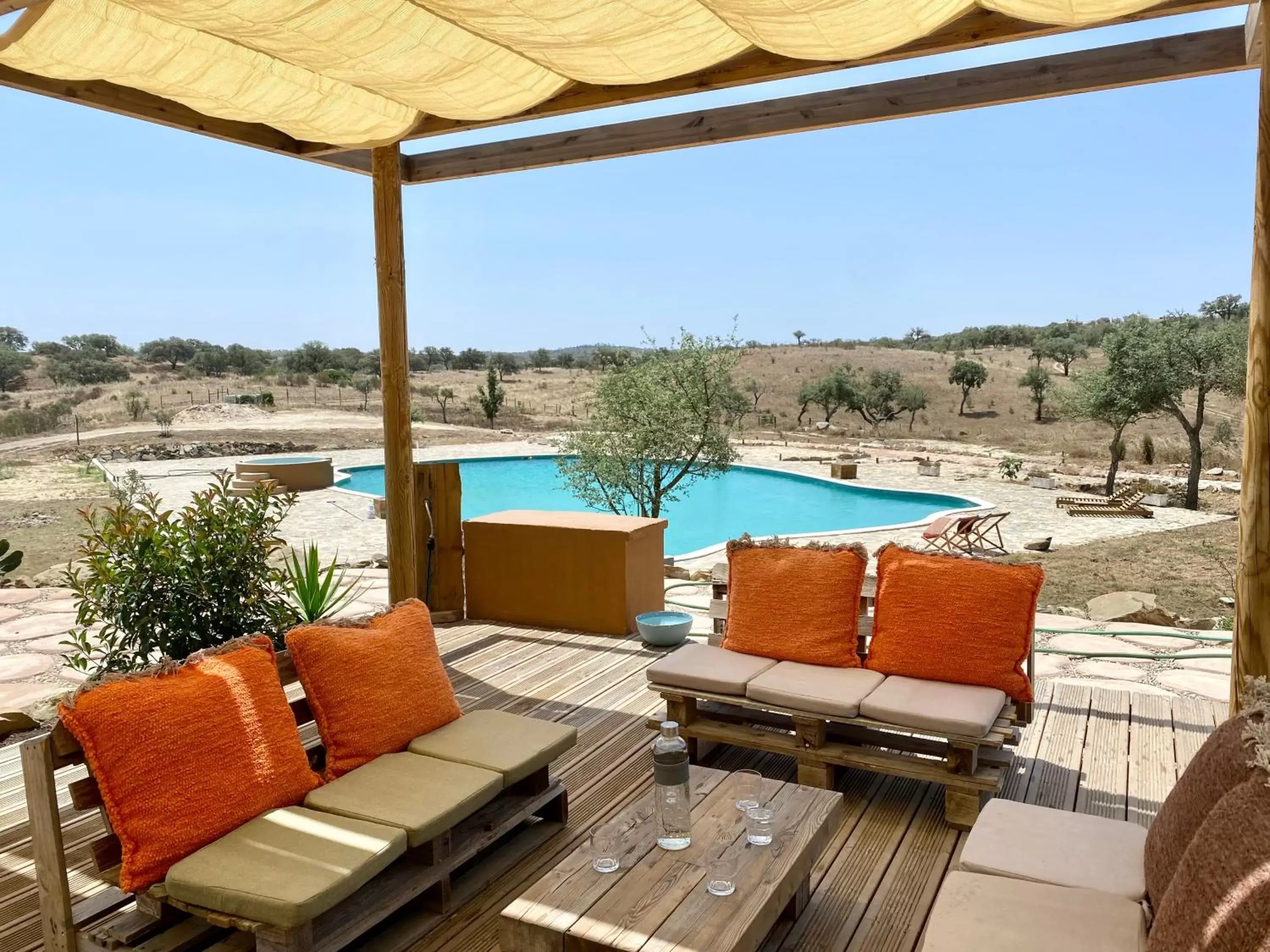 Patio, Swimming Pool in Luxury room at Mama-Adama Alpaca Farm